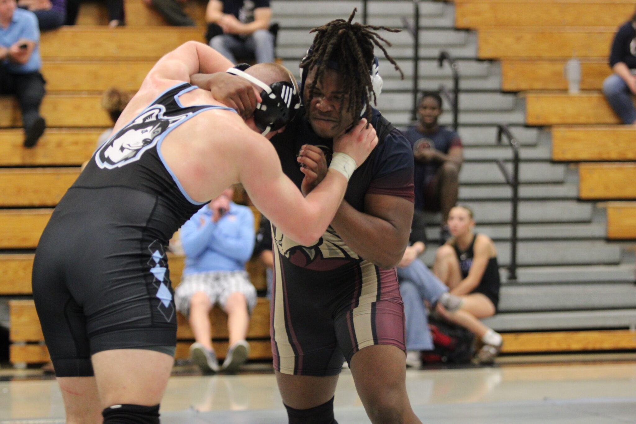 Elijah Jean tangled up with the top ranked wrestler from Hagerty in the final period of the District Championship match