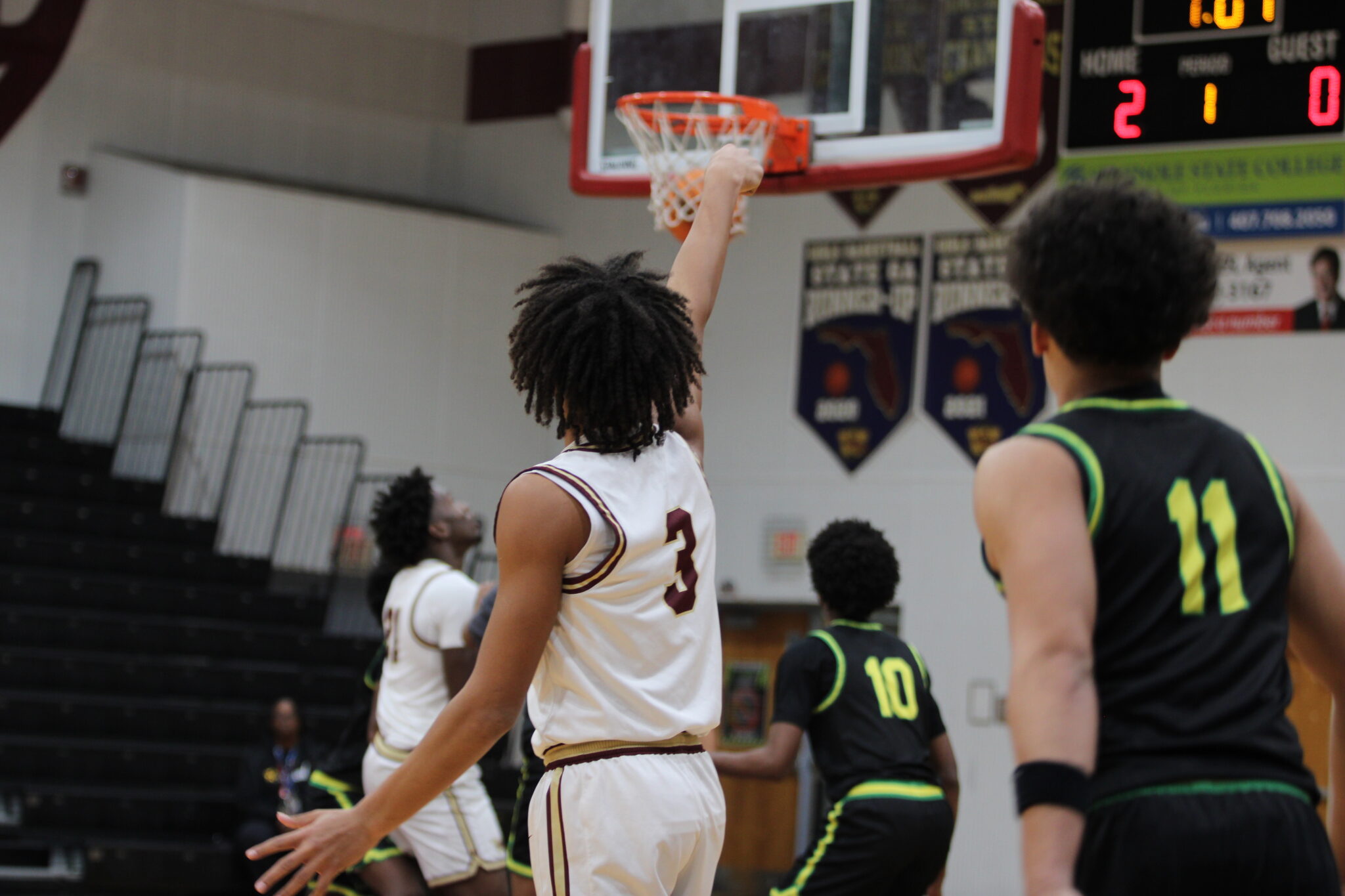 Eric Nichols drills the first 3 pointer of the quarterfinal matchup