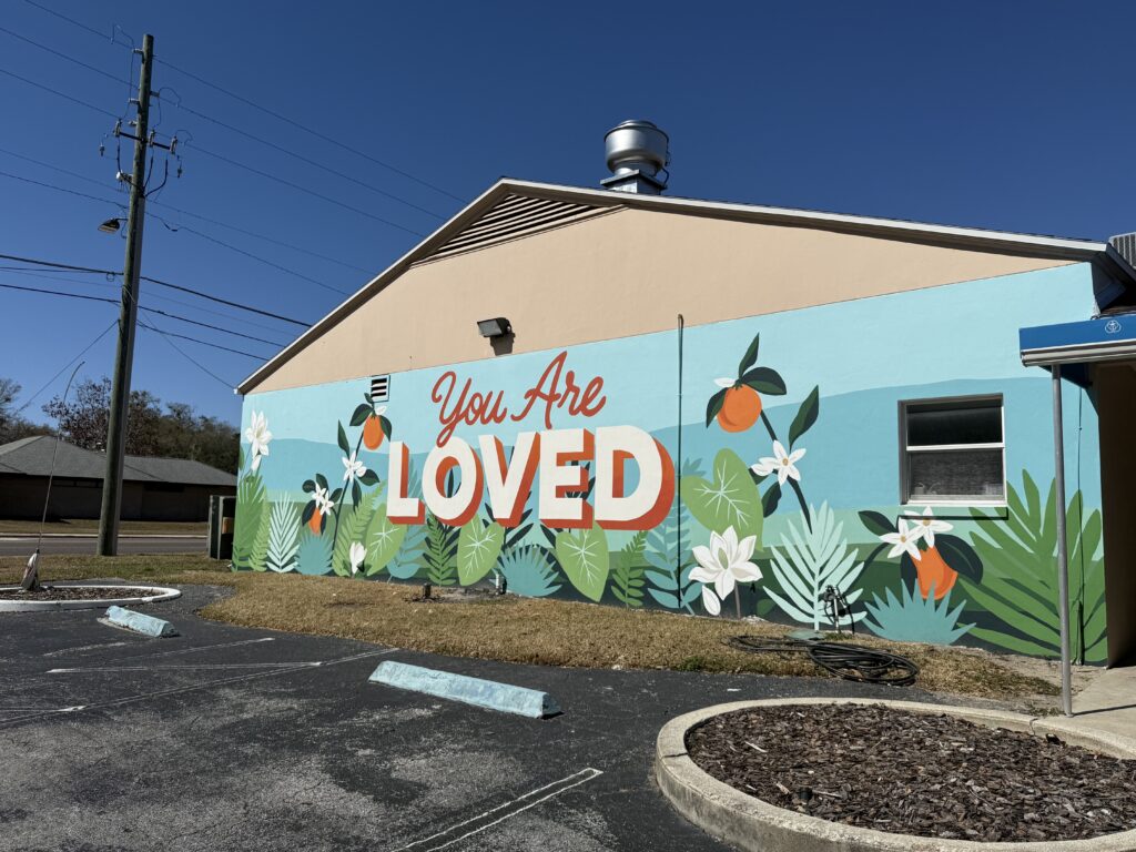 Creative Hub of Apopka president Melanie Jankun painted the new mural at First Methodist Church Apopka.