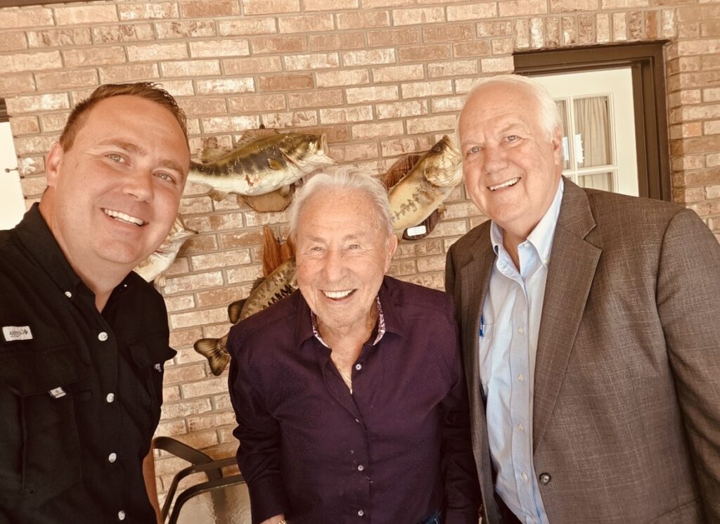 From left to right: Jason Bergenske, Lee Corso and Gary Bergenske prepare for Saturday's gala.