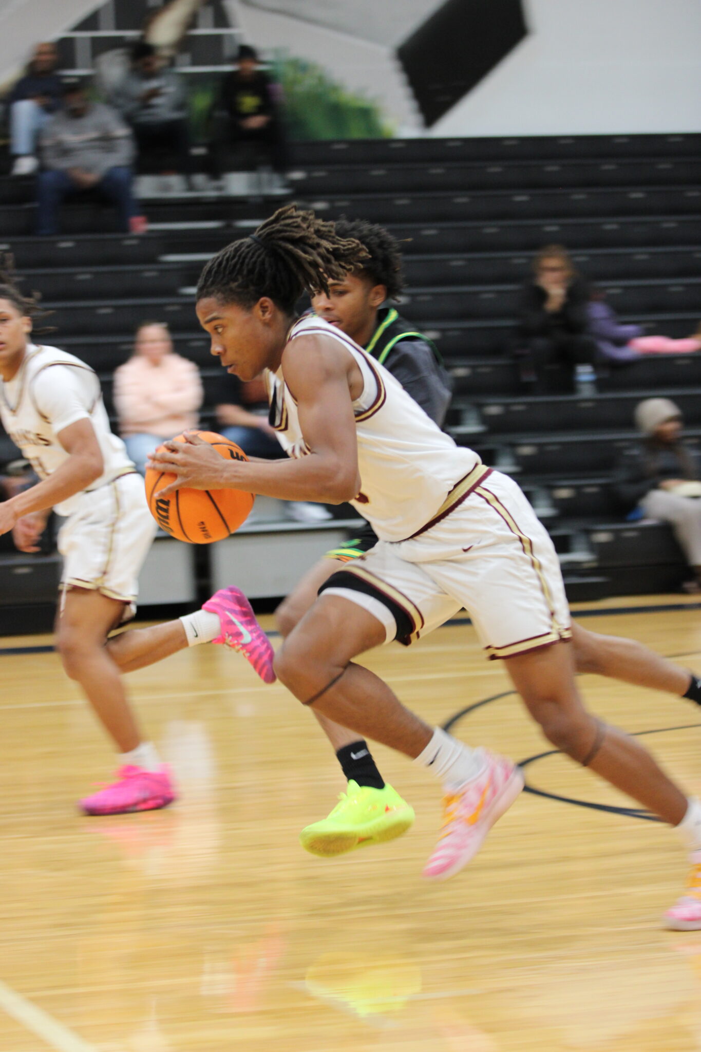 Khai Orr steals the ball and quickly runs in transition