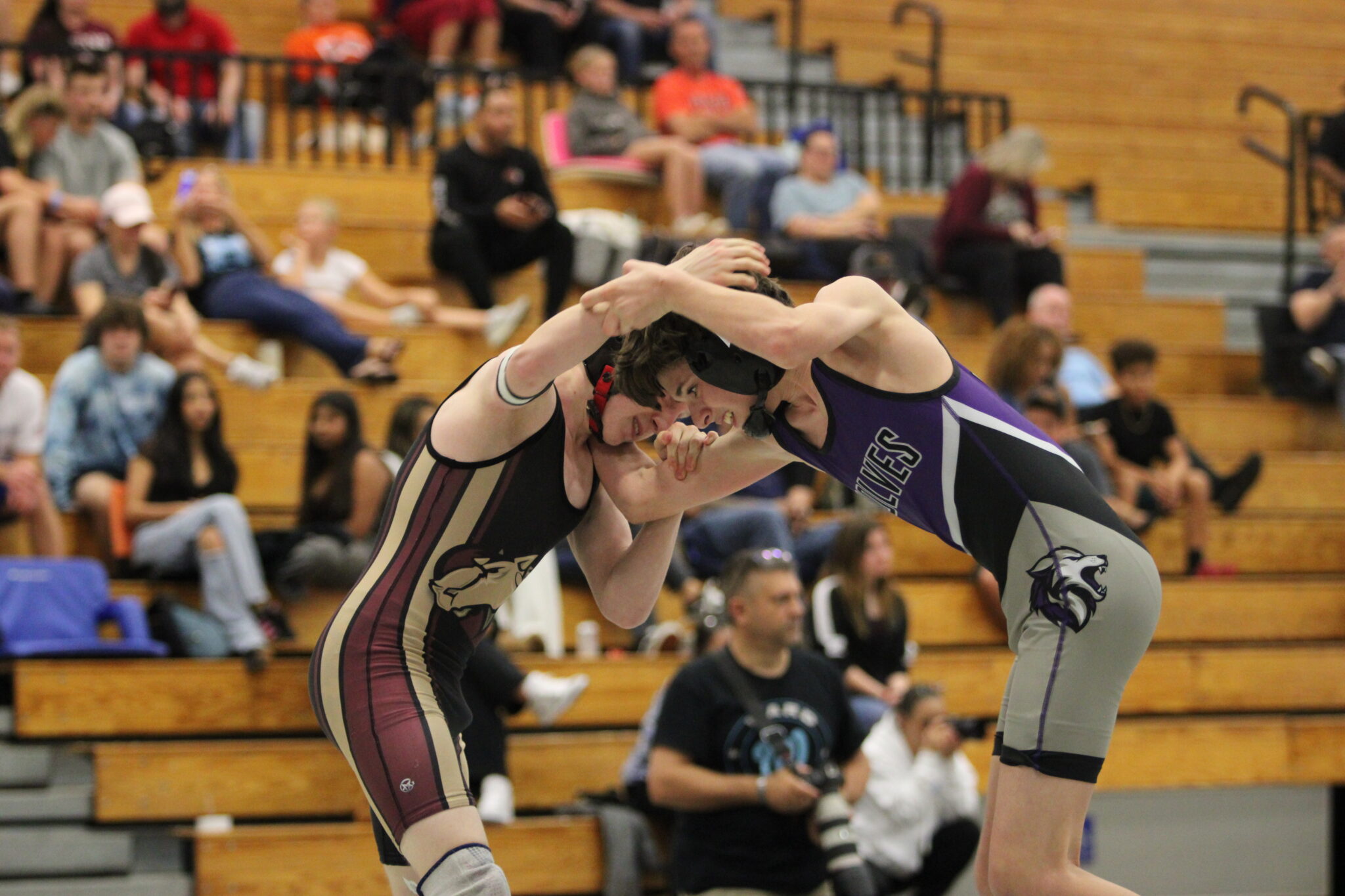 Landonn Shultz faces off with a Timber Creek Wolf in the 3rd place match at the District Tournament