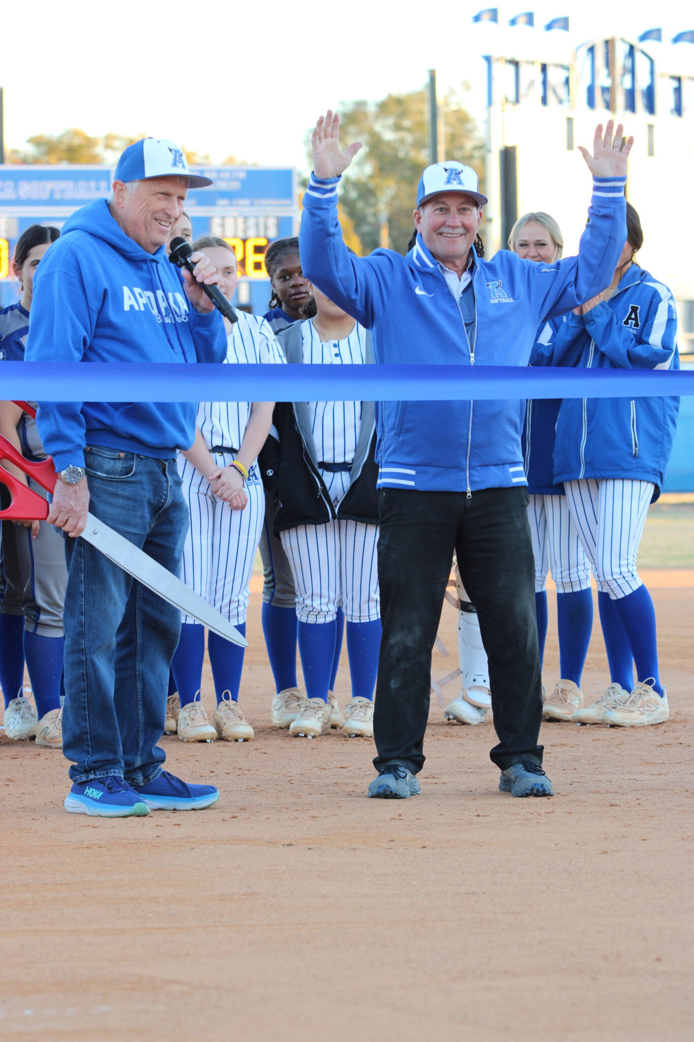 Mayor Brian Nelson and Coach Mike MacWhithey speak at the ribbon cutting