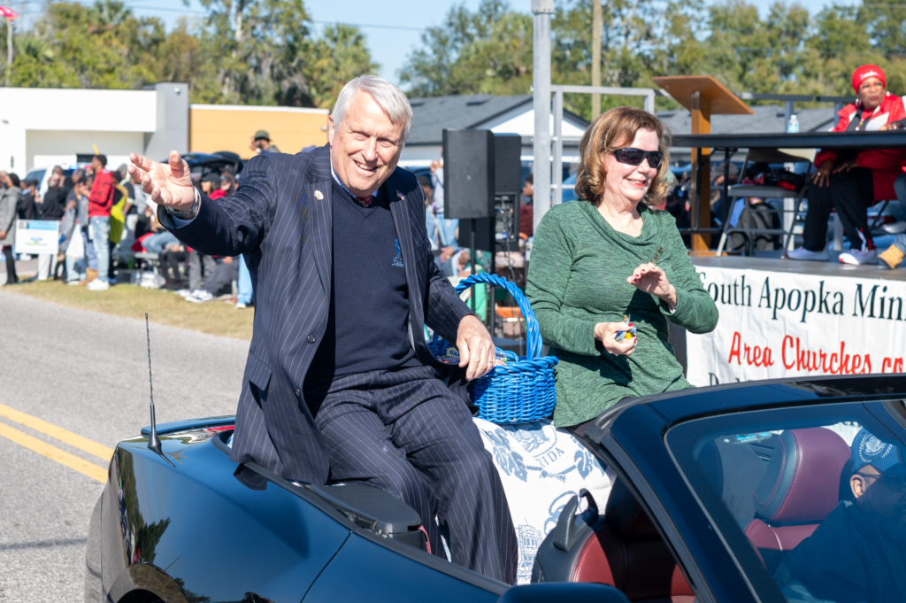 Mayor Bryan Nelson and his wife Debbie Nelson wave at the 2026 Martin Luther King, Jr. Parade.