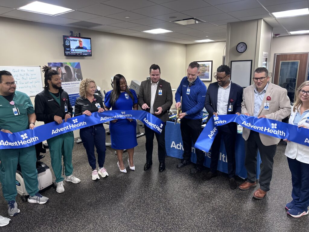 AdventHealth Apopka officials and staff cut the ribbon of its new intensive cardiac rehabilitation facility, allowing patients to get rehab in Apopka instead of going to other campuses.