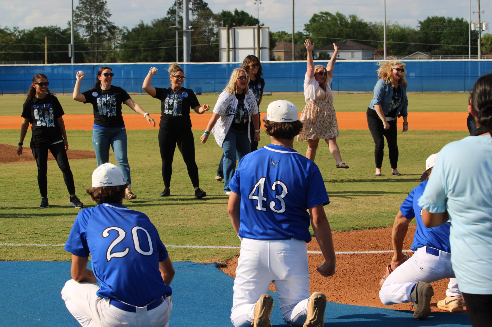 Apopka baseball Senior moms throw out their first pitch