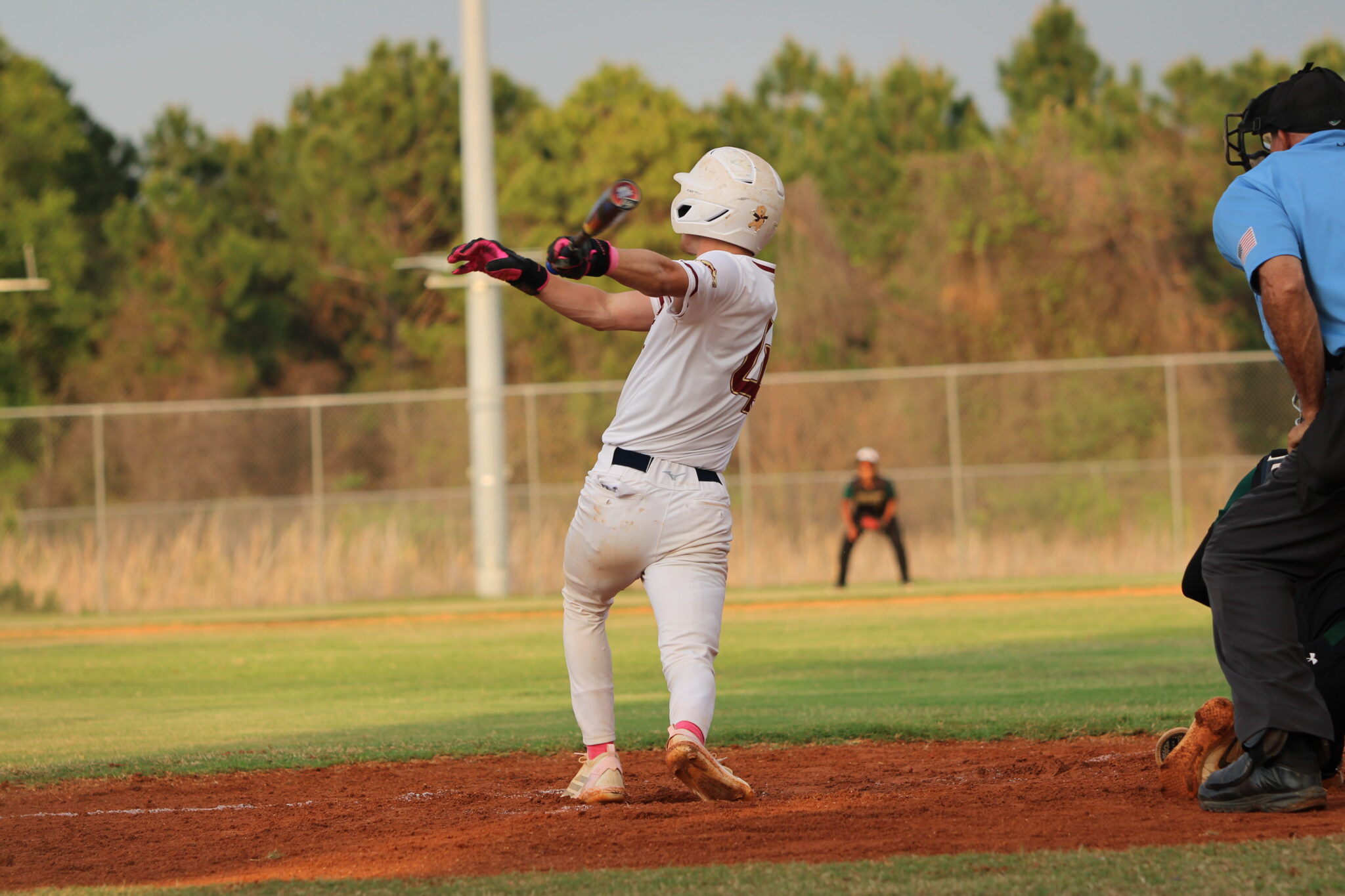 Brady Reinert drills a ball to left center field against Liberty