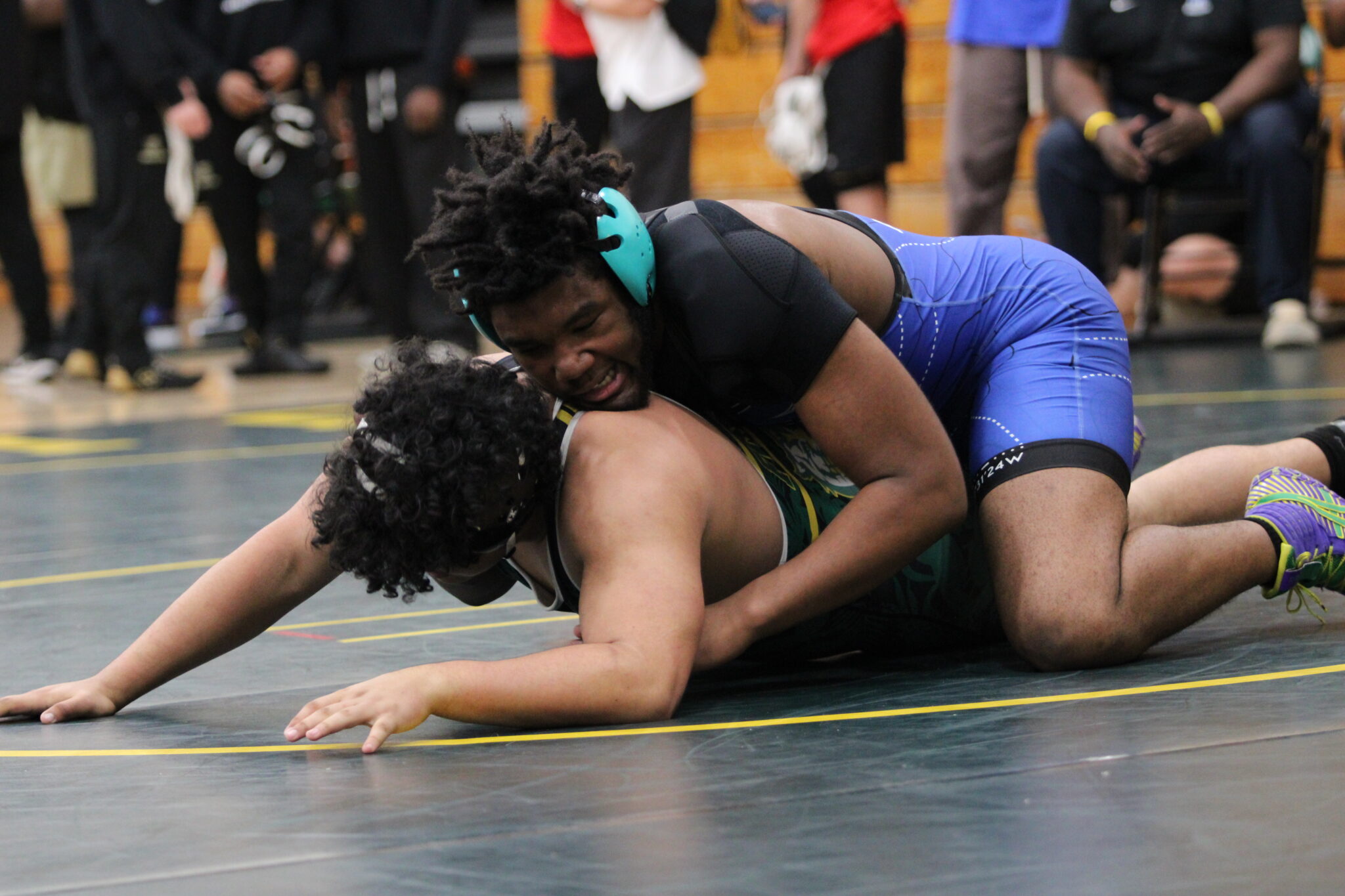 Brandon Roberts mounts his opponents back from Forest in the consolation round of the regional tournament