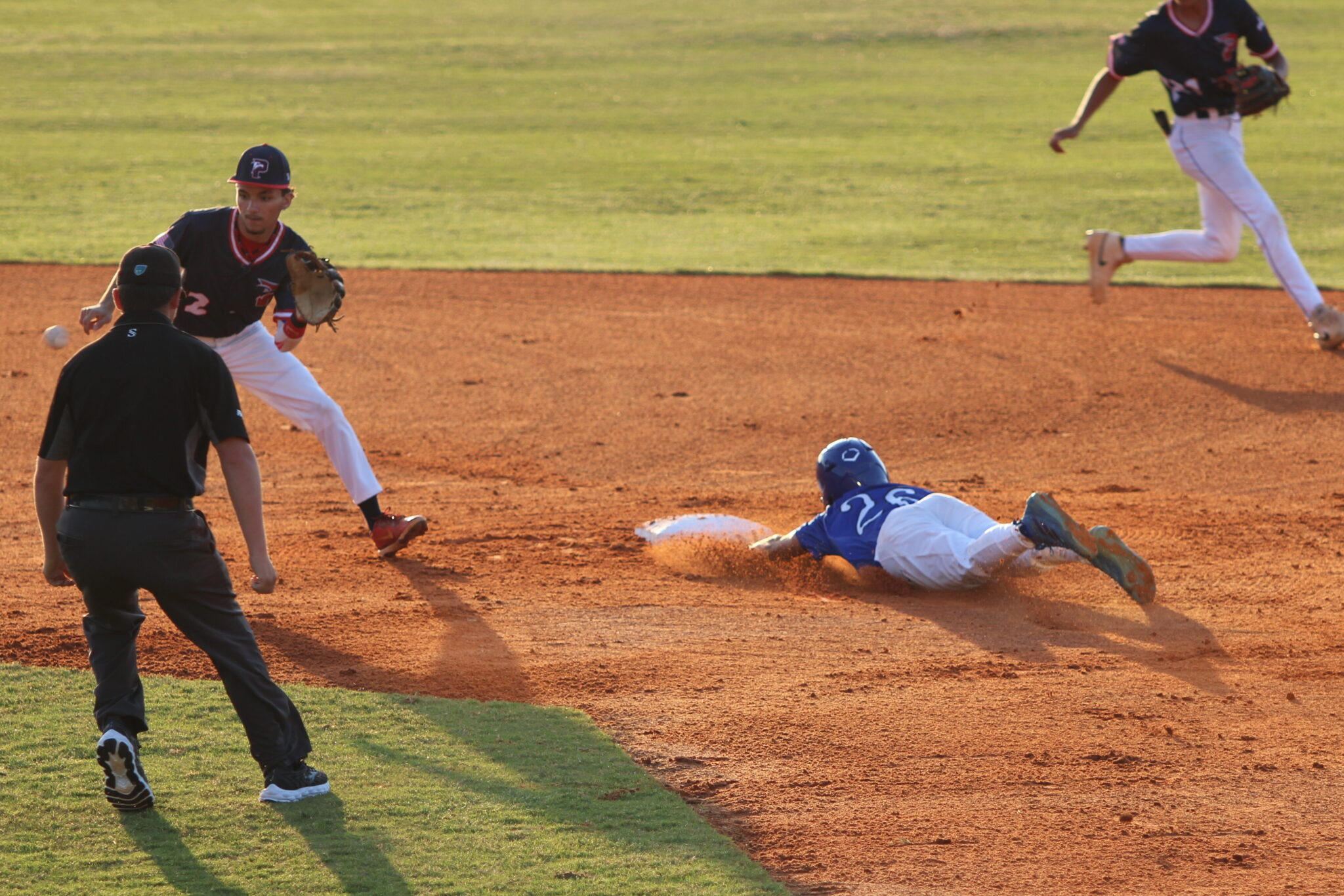 Chance Saunders steals and slides into second base