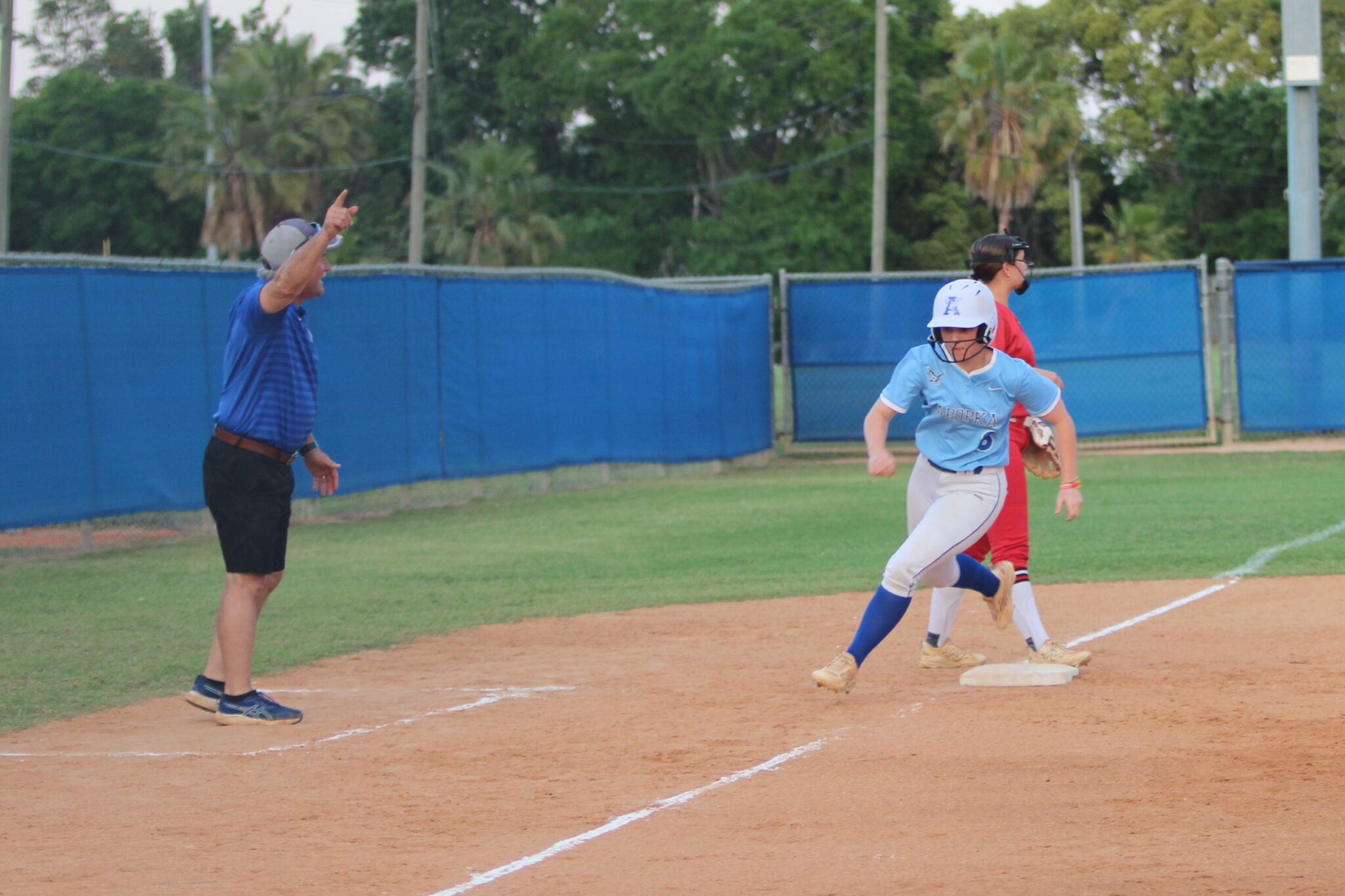 Coach Mike MacWithey sends Ford home on the deep shot by Ava Gonzalez