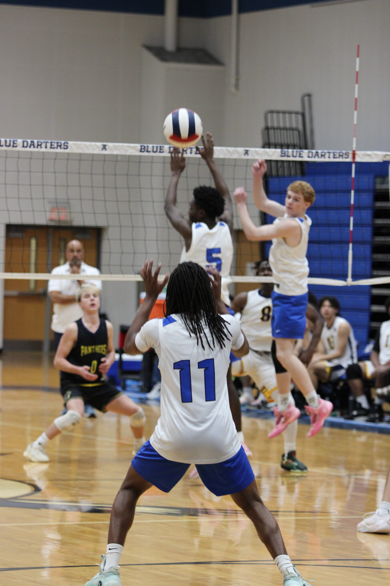 Elzie Robinson in perfect positon to set the kill attempt from Forest Lake Academy