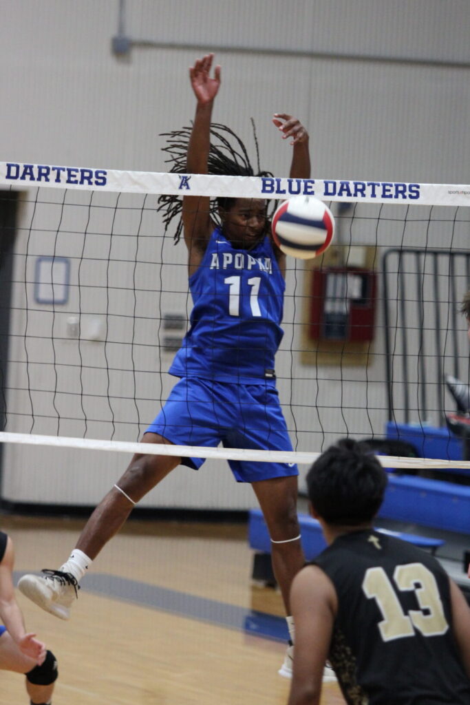 Elzie Robinson rises up to stuff a block back into the Bishop Moore player