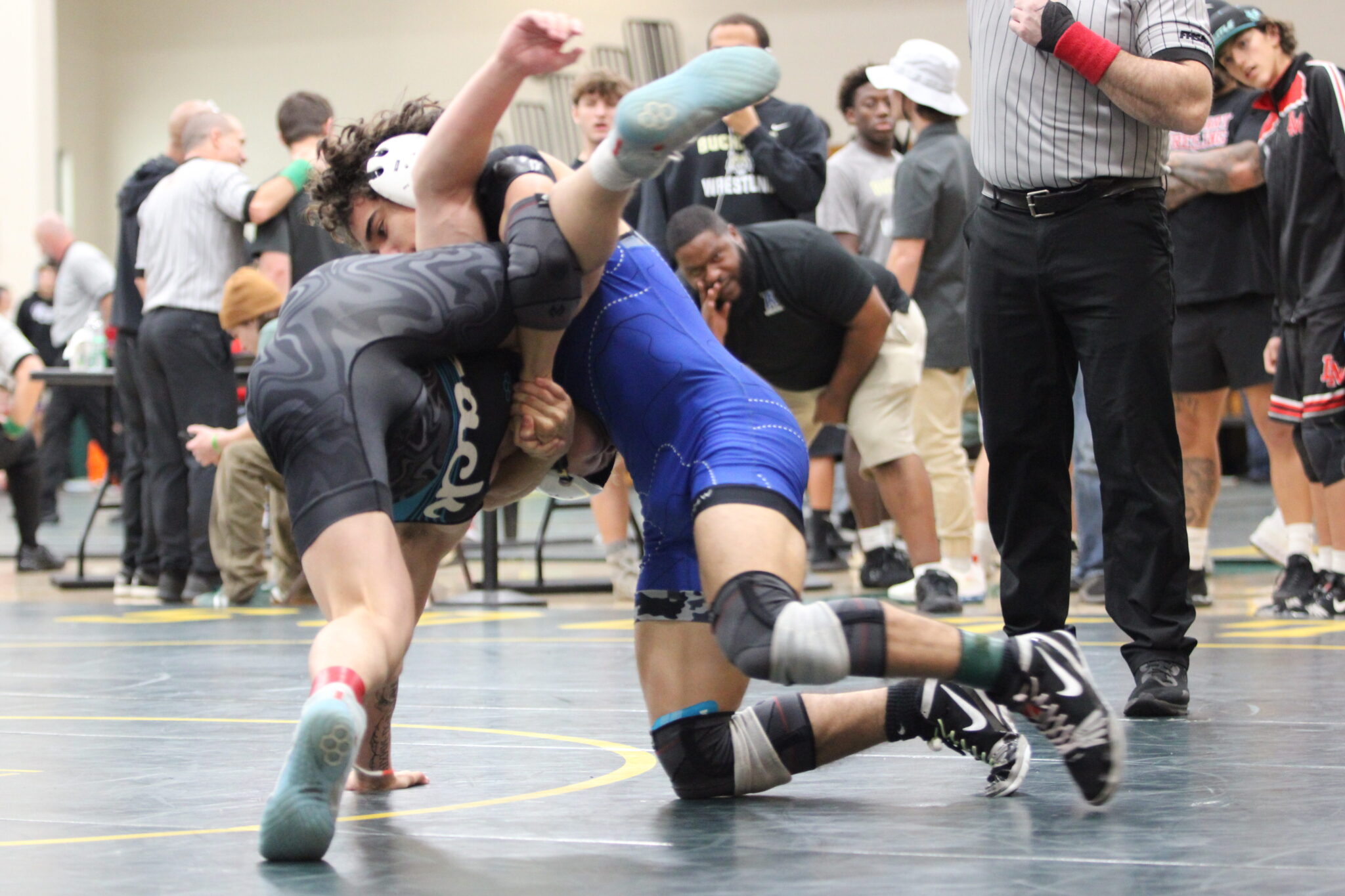 Hector Santana tries to work a cradle on his West Port opponent in the first round of the Regional tournament