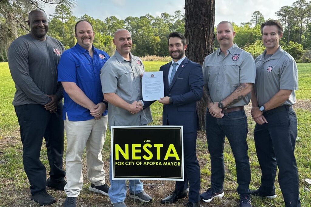 The Apopka Professional Firefighters Association Local 5293 announces its endorsement of City Commissioner Nick Nesta (third from right) for mayor.