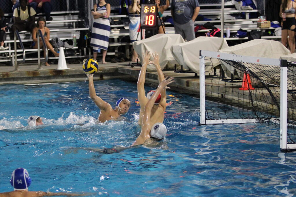 Isaac Sanchez missiles a shot at the Windermere goalkeeper