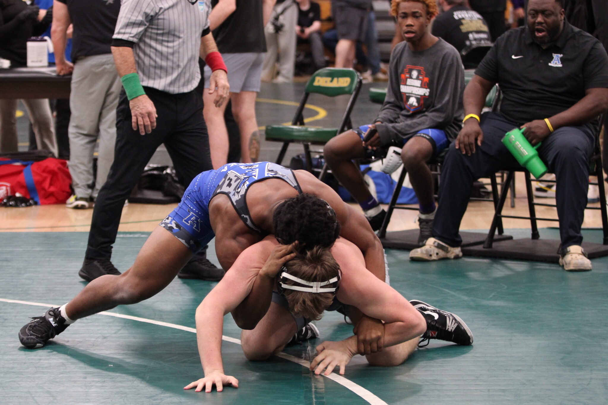 Marcus Young mounts the Lake Brantley wrestlers back early in the first round match