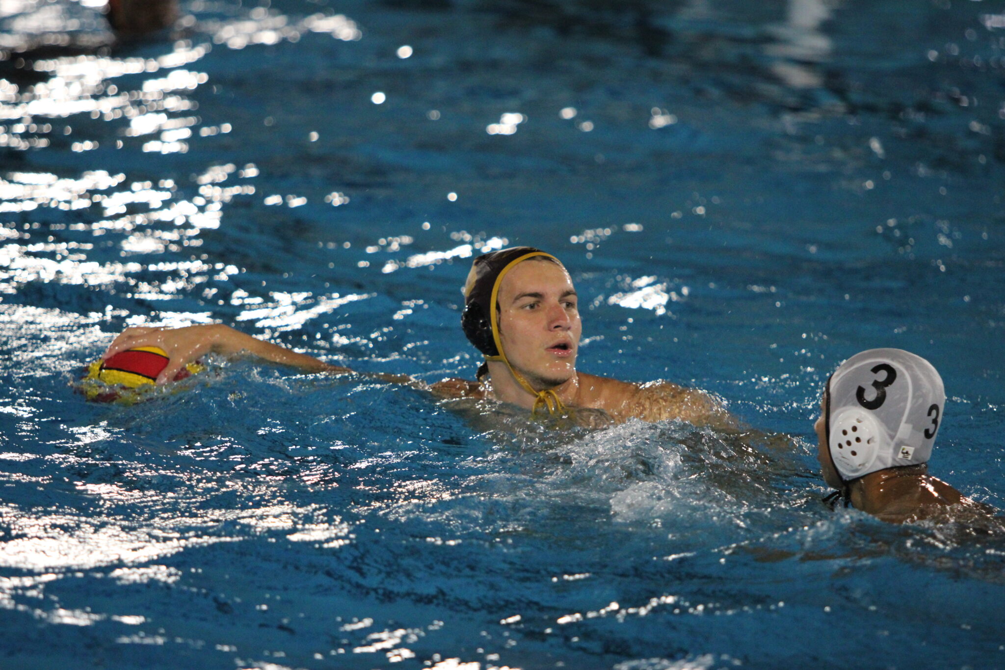 Senior John Foster looks up the pool for an open Mustangs