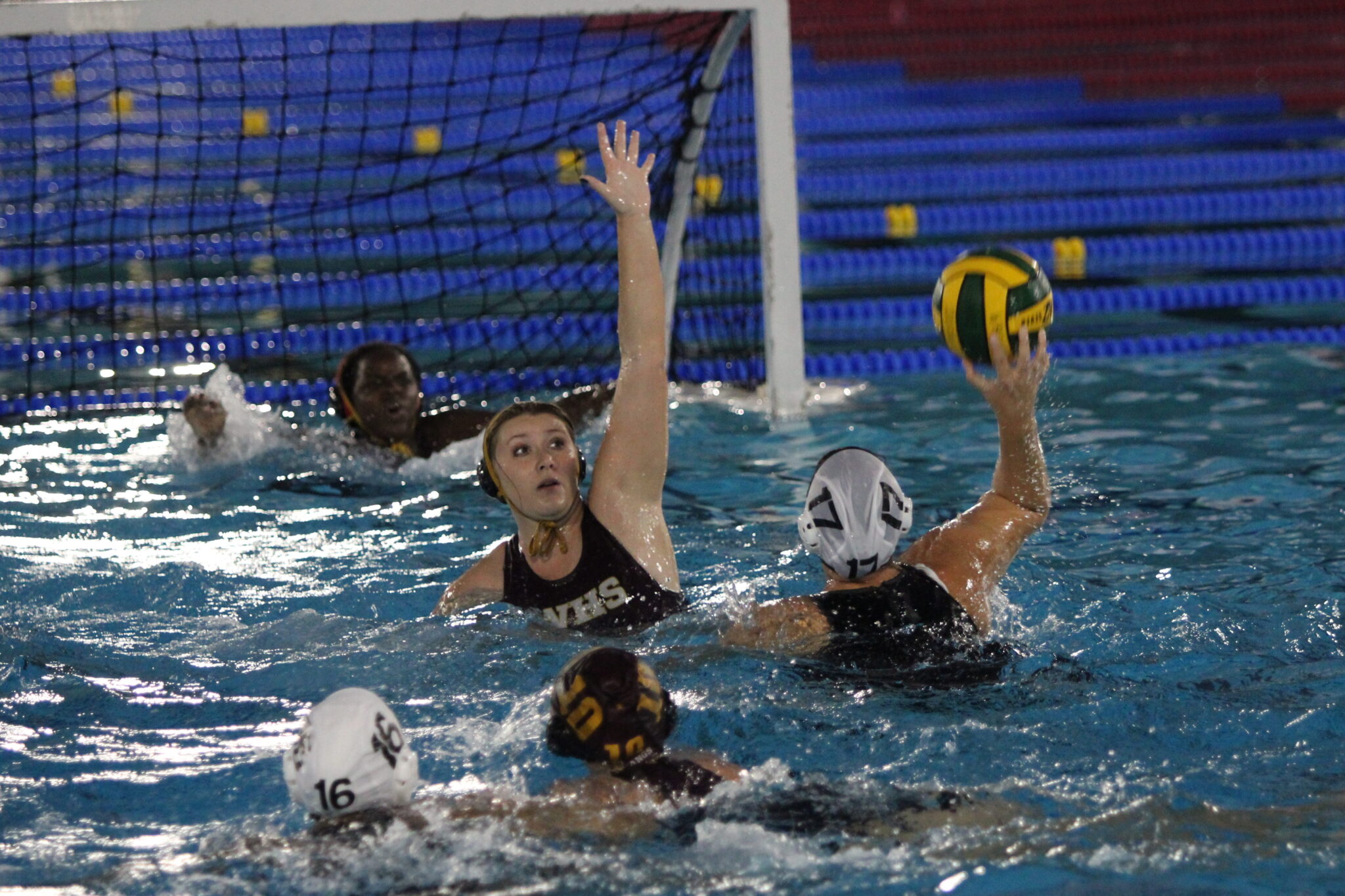 Senior Rylee McCawley gets in the way of the Winter Springs shot