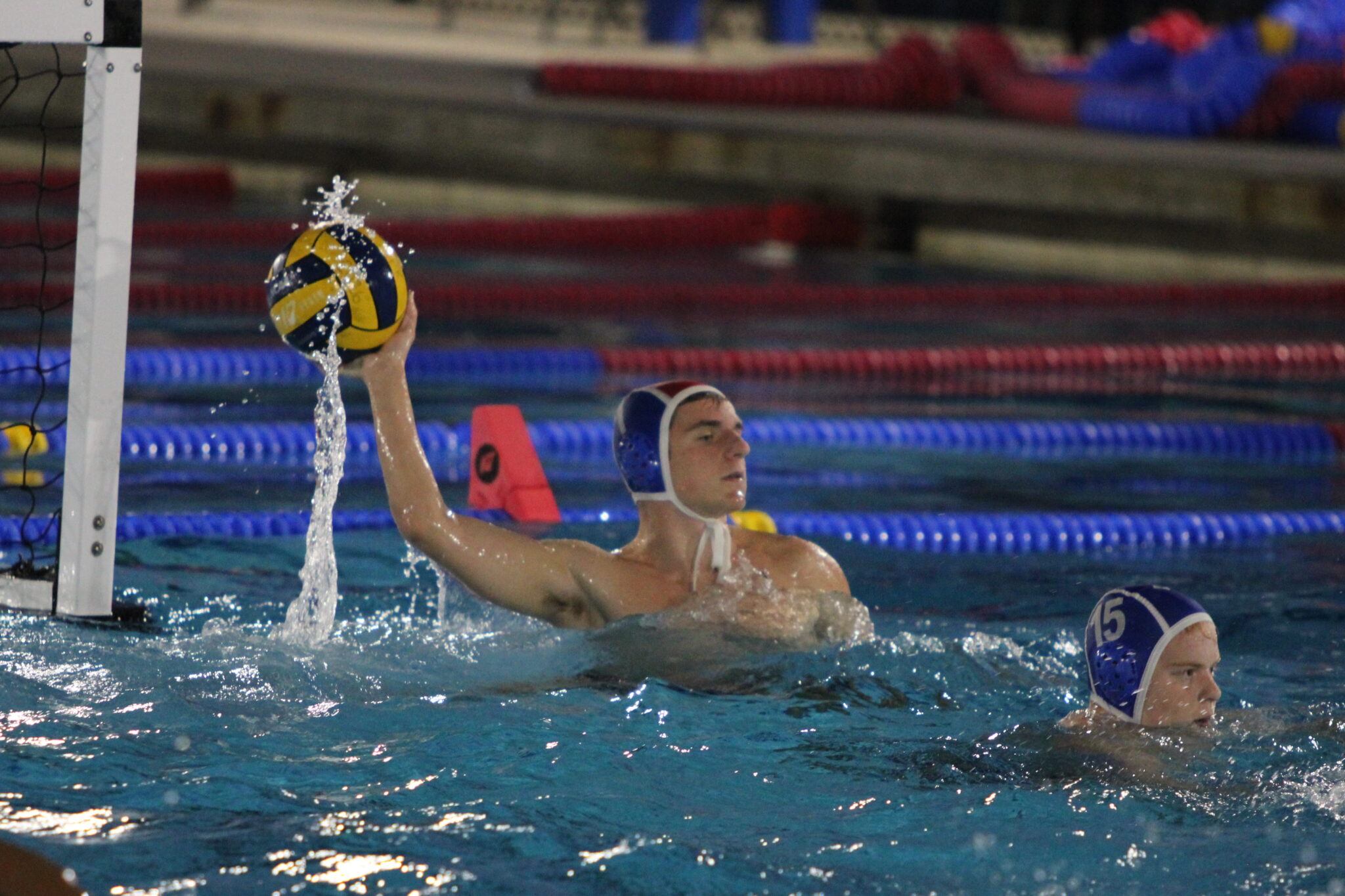 Travis Novak launches the ball up the pool after his save in hopes for a counterattack