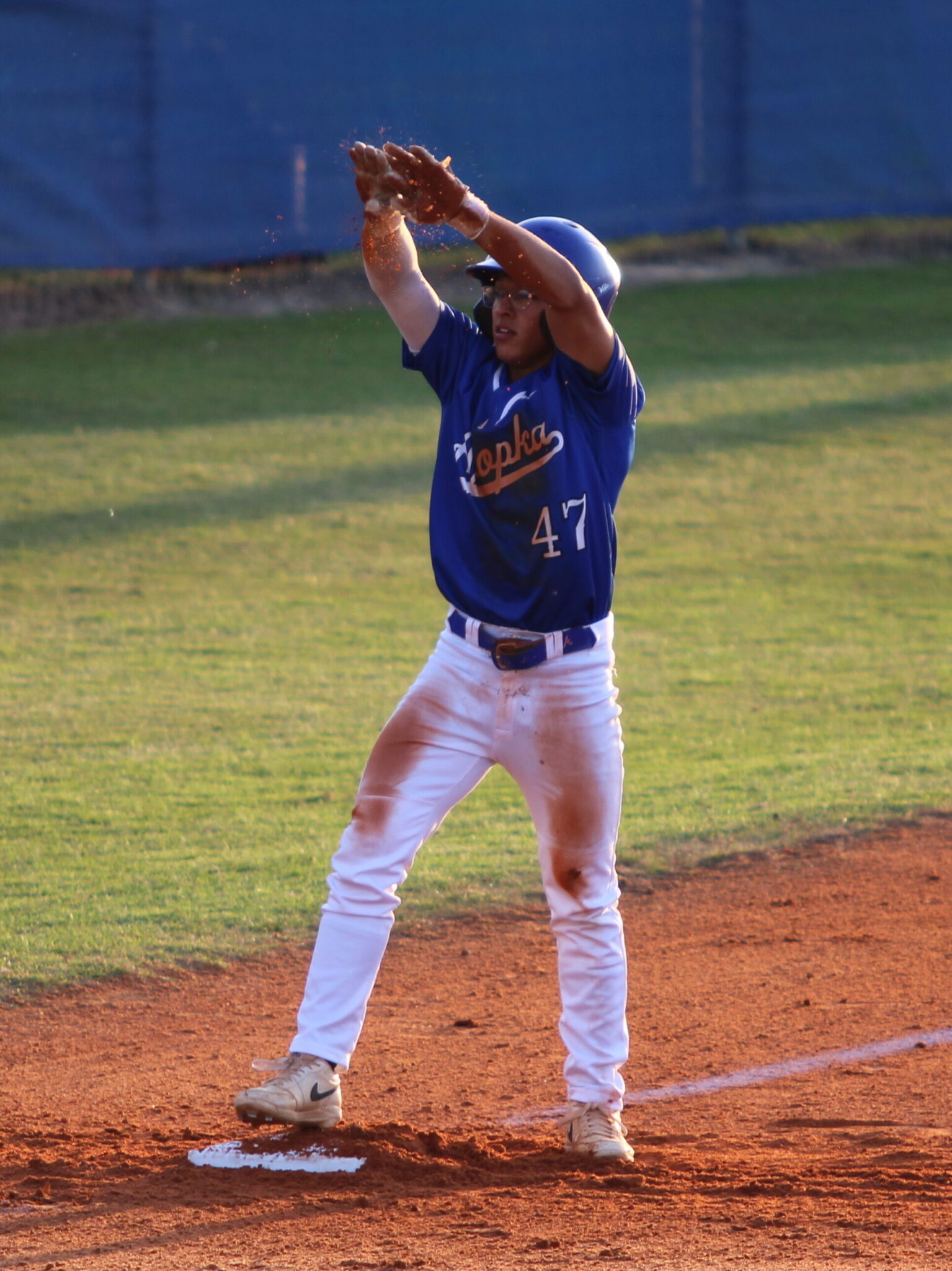 Ty Livingston shows love to the crowd after his triple on senior night