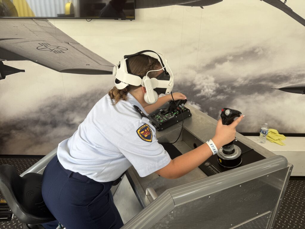 Wekiva High School JROTC cadet Isabella Robinson completes an aerial refueling virtual reality simulation at last October's recruiting event.