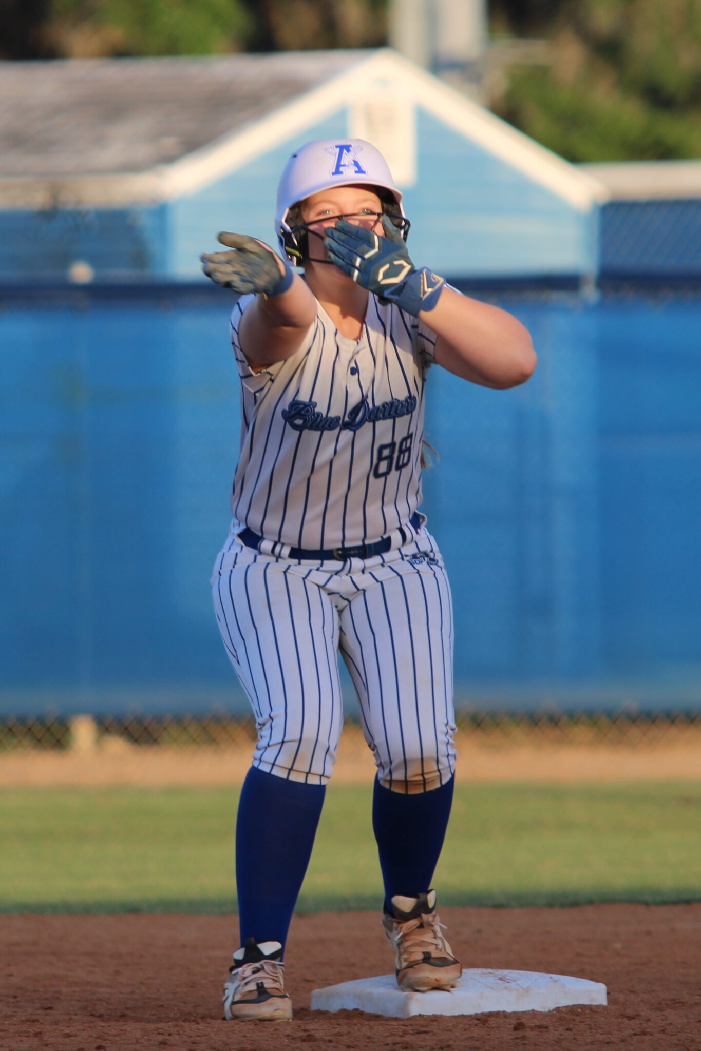Alezia Hatcher hits the popular 'Zombieland' Celebration after her 2 RBI double in the first inning