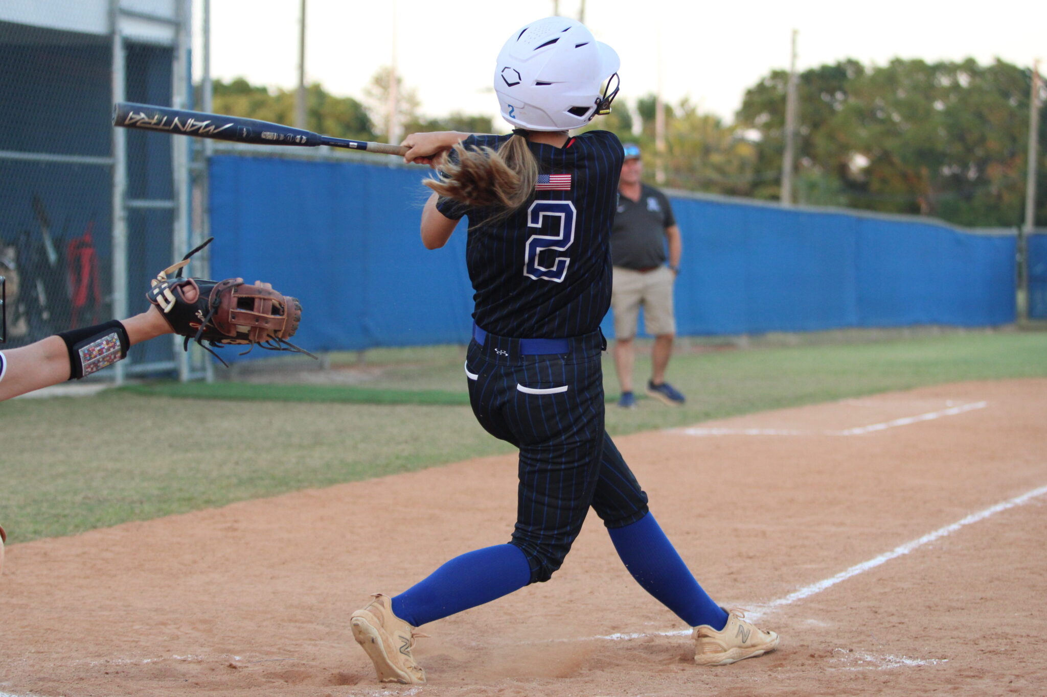 Ava Gonzalez lines a hit into left field
