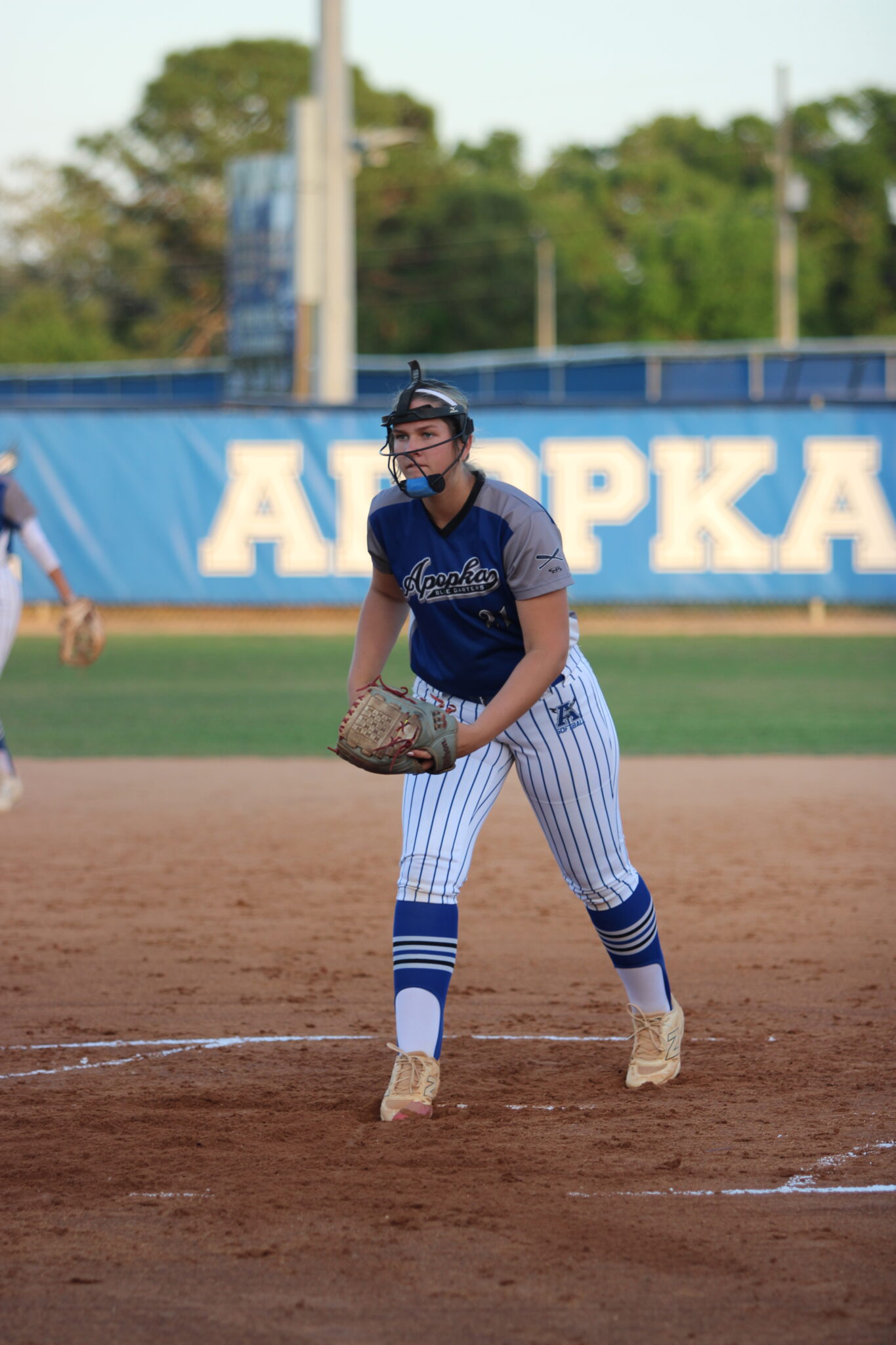 Ava Millspaugh eyes the batter and prepares her pitch