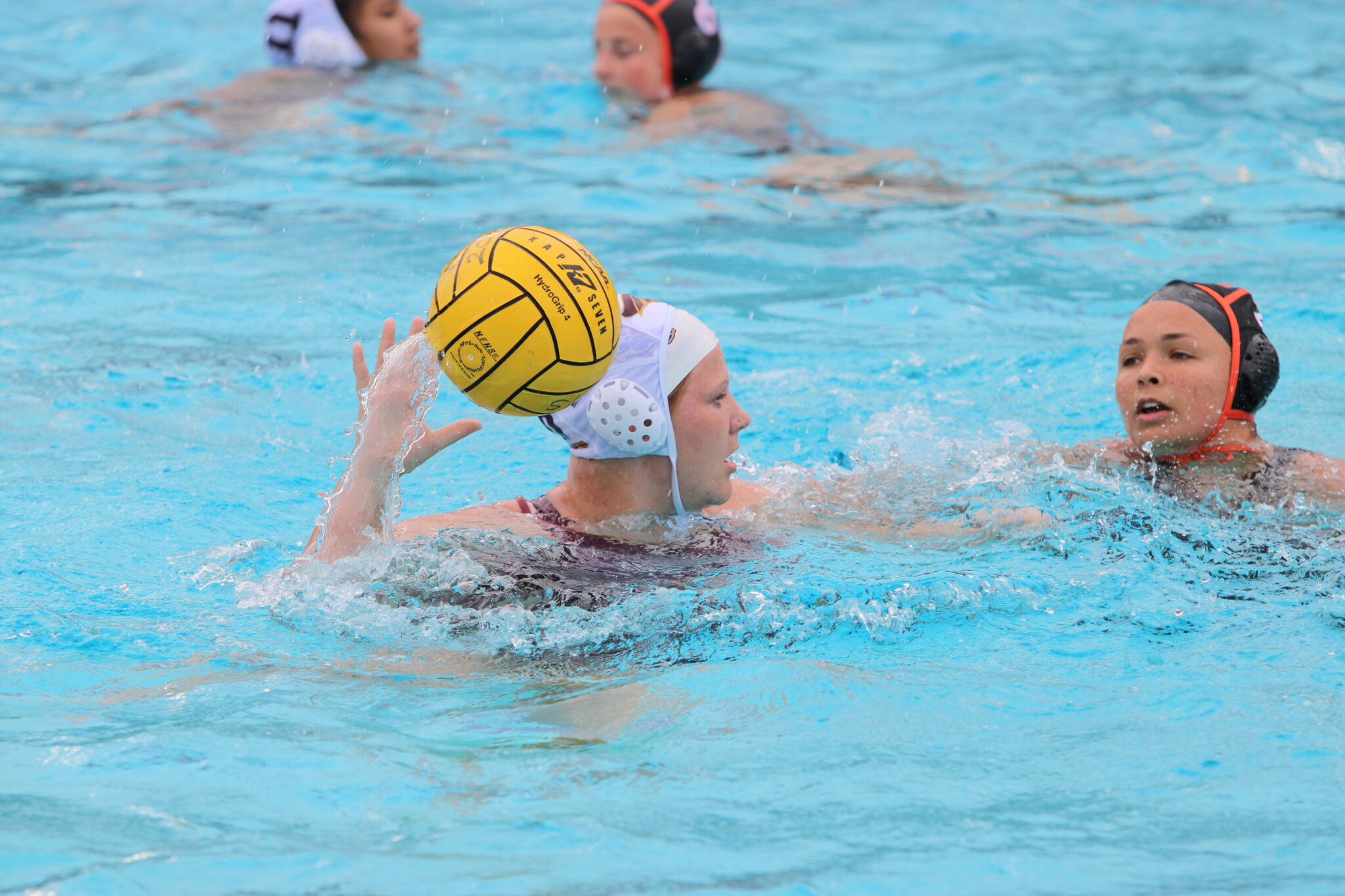 Avery Megargee holds possession while looking for an open teammate