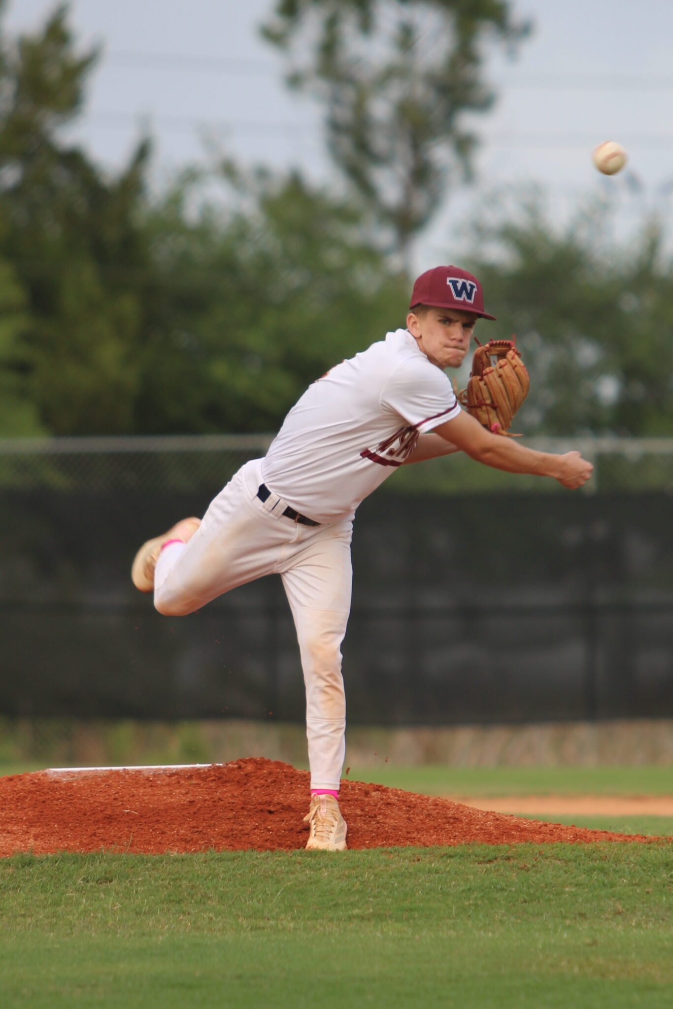 Brady Reinert zips a pitch toward a Circle Christian batter in the first inning