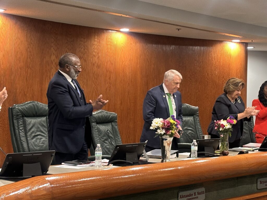 Commissioner Alexander H. Smith (L) and Mayor Bryan Nelson (R) deliver their farewell remarks at the Wednesday City Commission meeting.