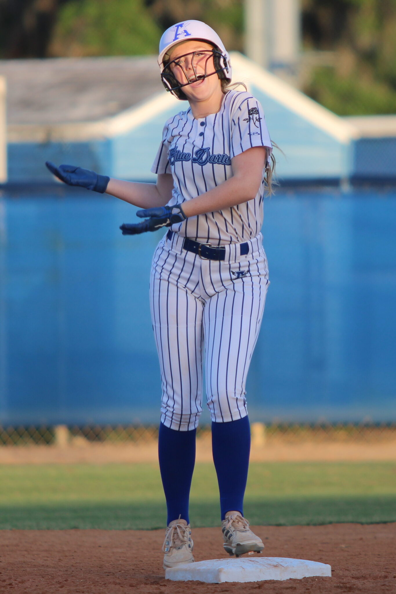Haylee Thames hits a double into the gap that rolls to the fence and does a happy dance on second base