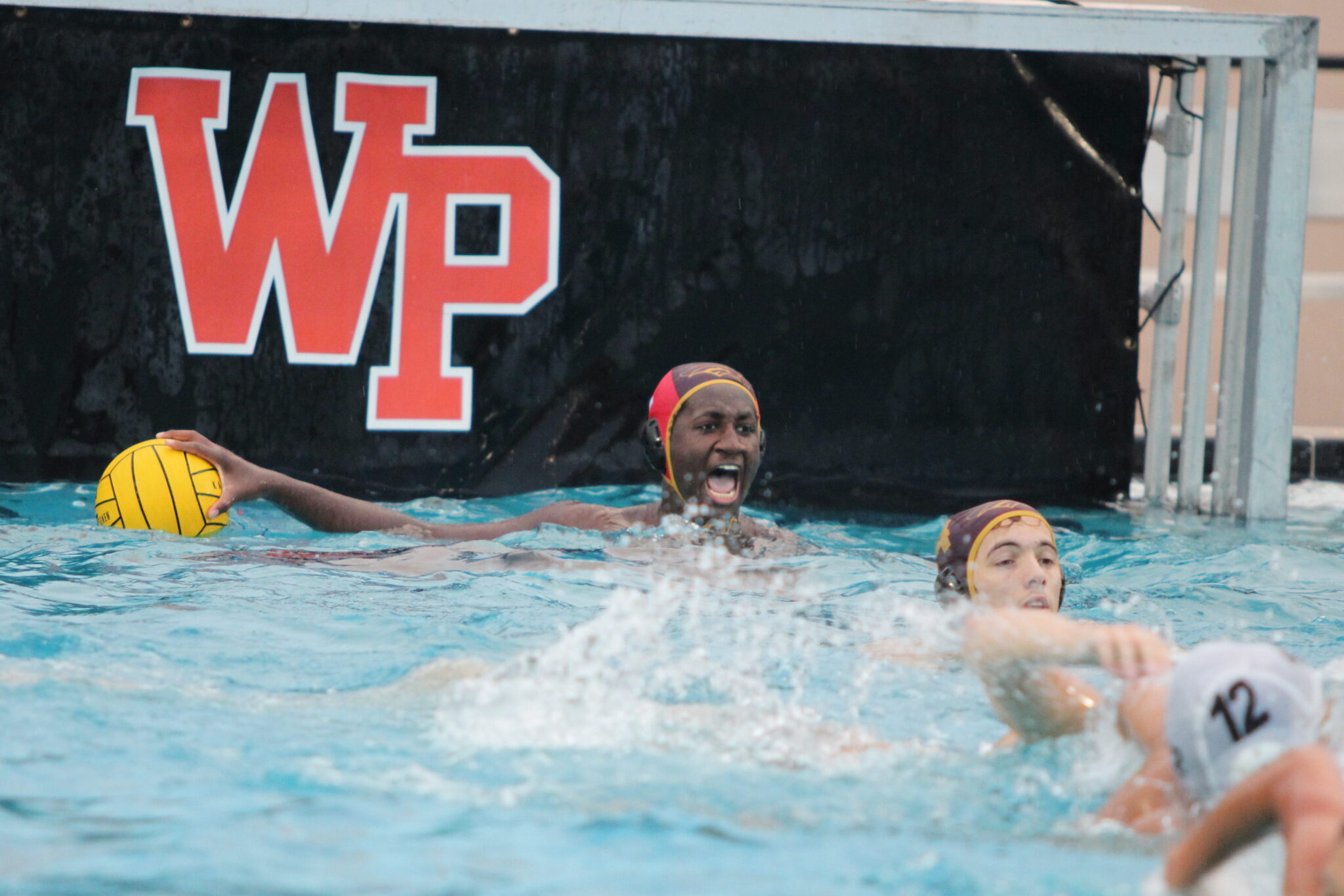 Jaison Harris screams out for Cameron Parry up the pool as he tries to connect a long pass with him