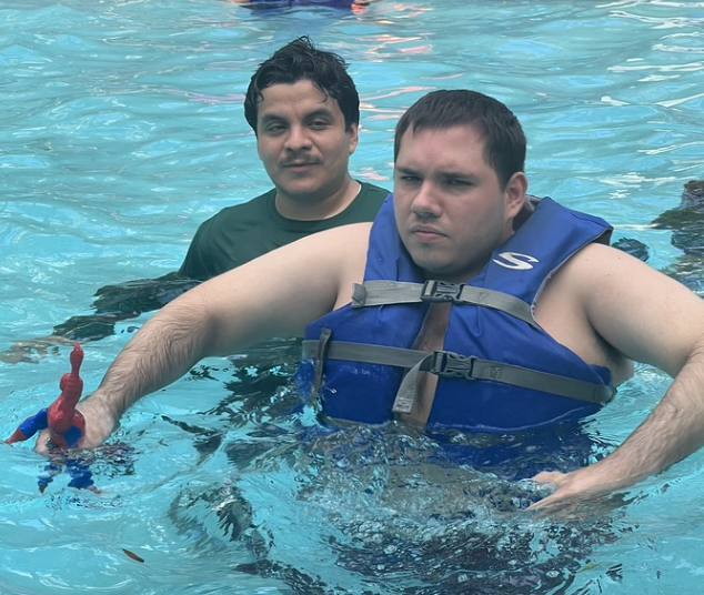 John Loizos swims in the Camp Thunderbird pool.