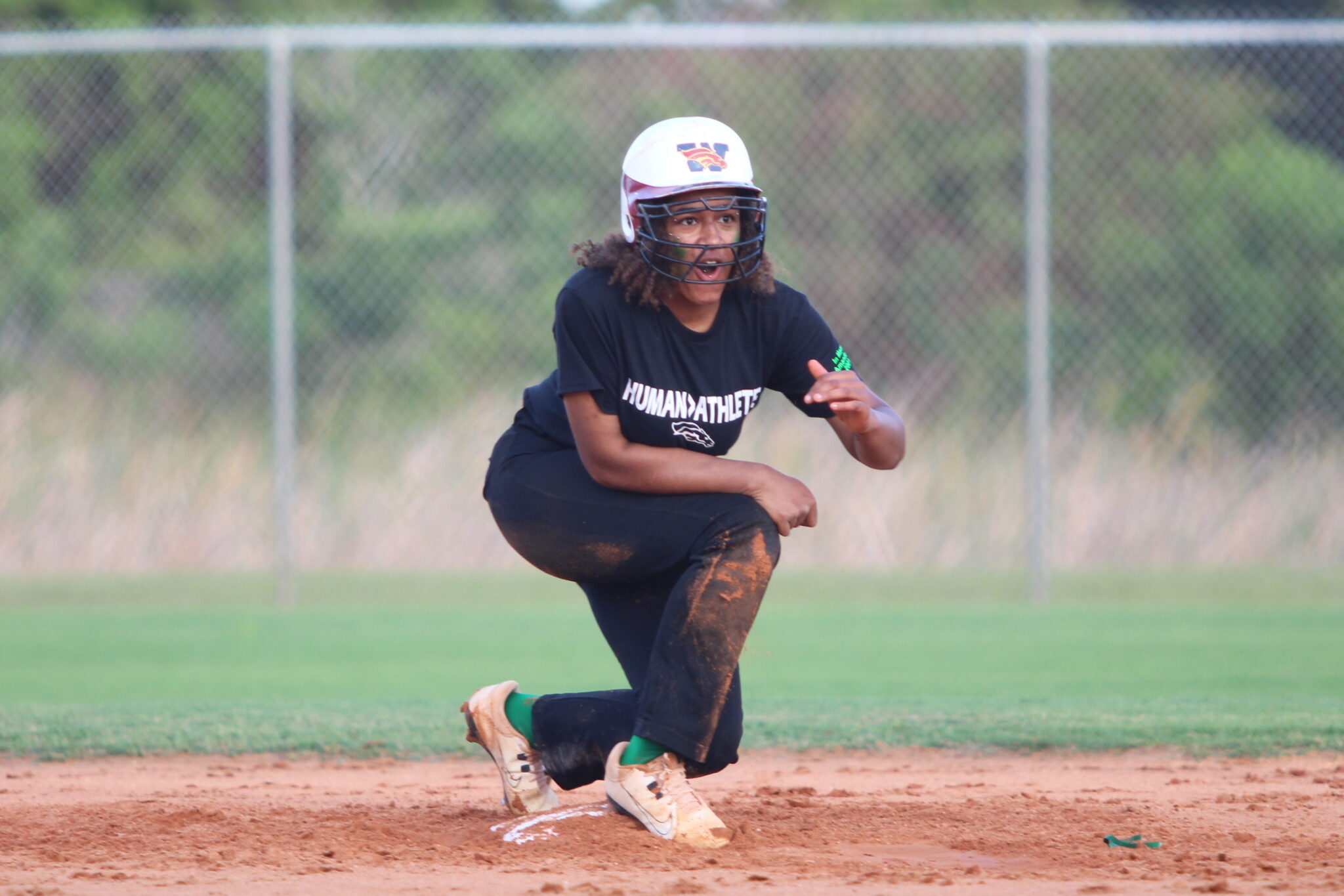 Makenzy McIntosh slides in safely at second