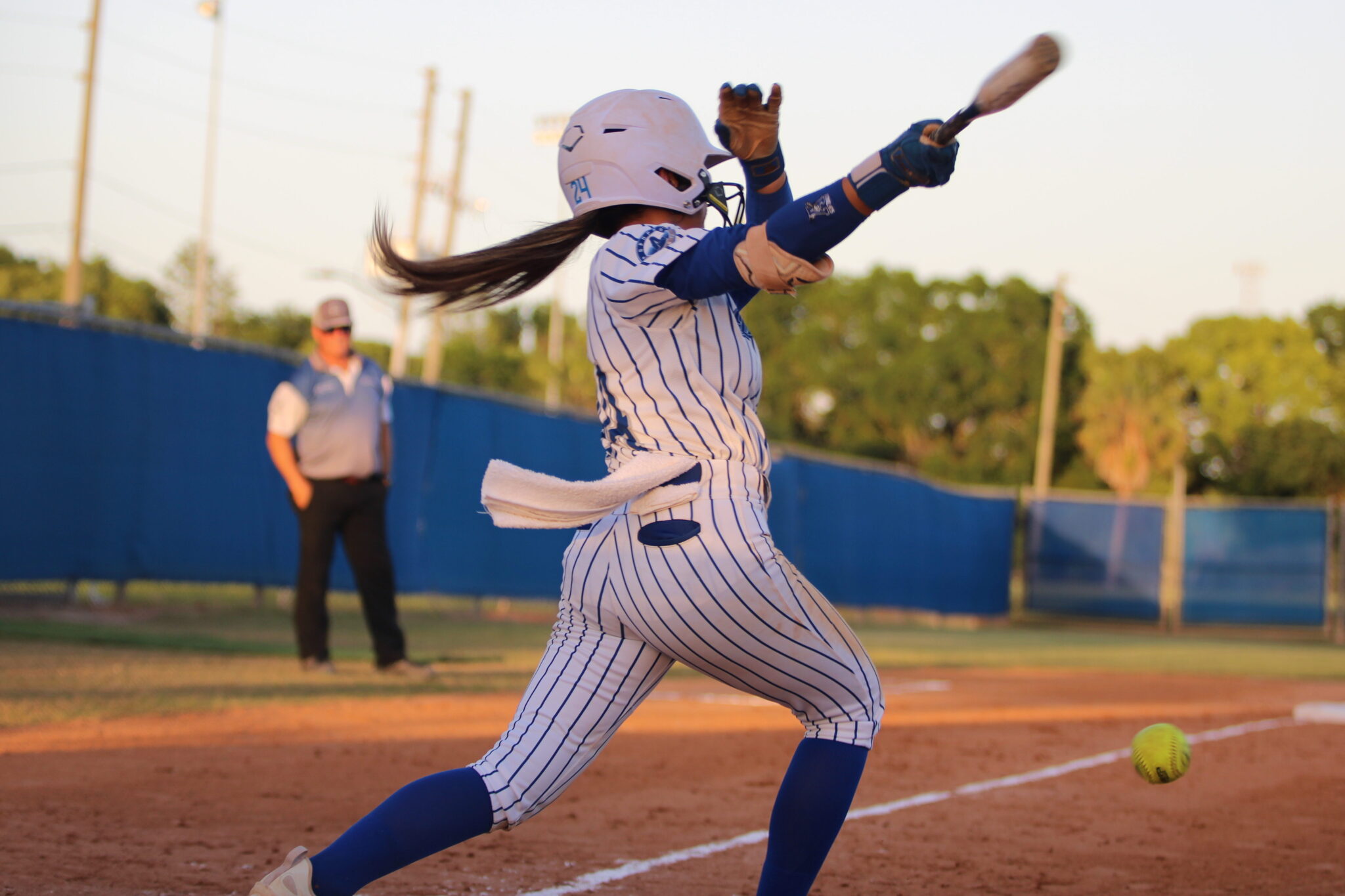 Shylah Pino tacks on her second hit of the first inning after beating the throw to first base