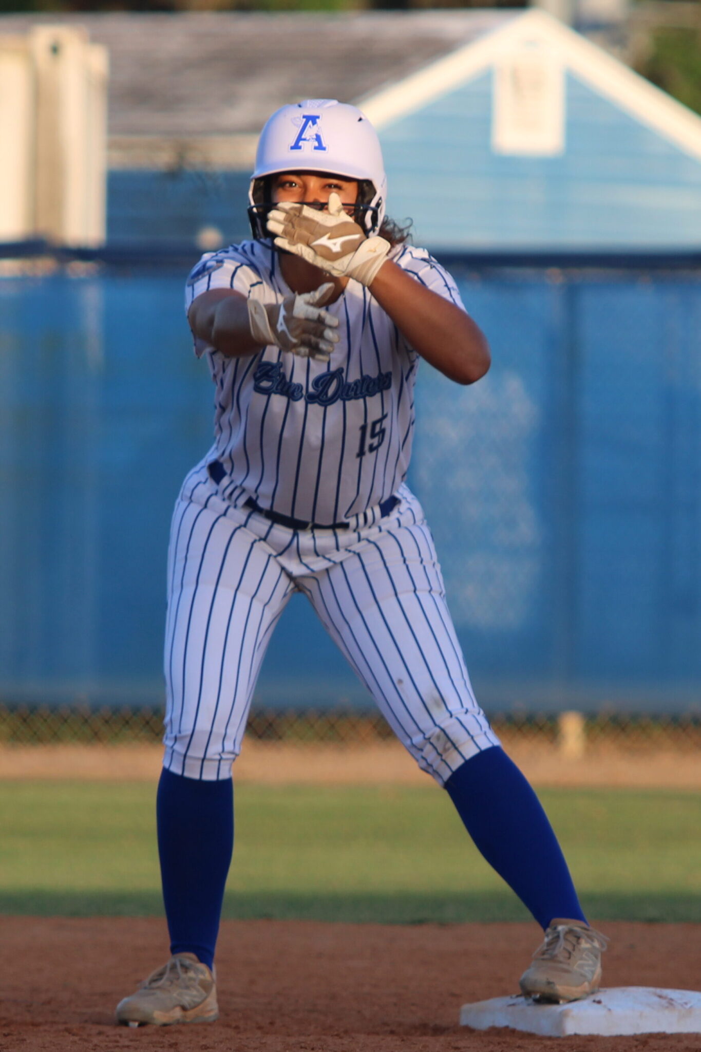 Victoria Shaw hits the 'Zombieland' celebration after her two RBI double in the first inning