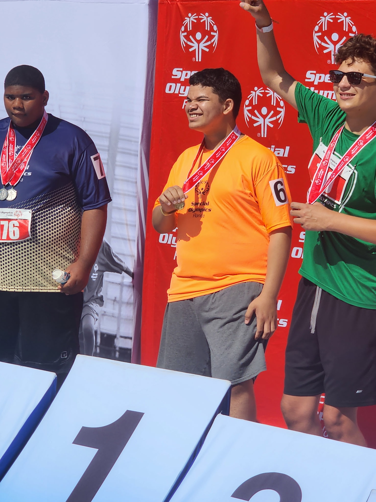 Jeanvier Rivera Rivera poses with his medal at the Florida Special Olympics