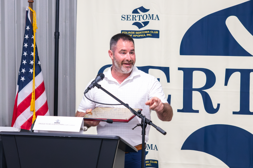 Business owner James Maltby shares remarks after receiving the 2026 Service to Mankind Award on April 28.