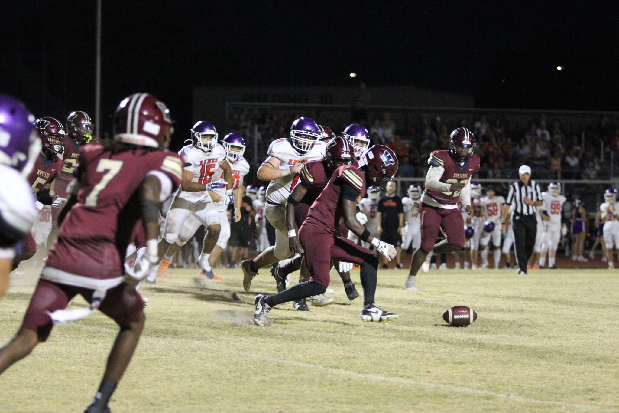 Avante Scott scoops up the loose fumble and takes it to the house, play called back due to a block in the back penalty.