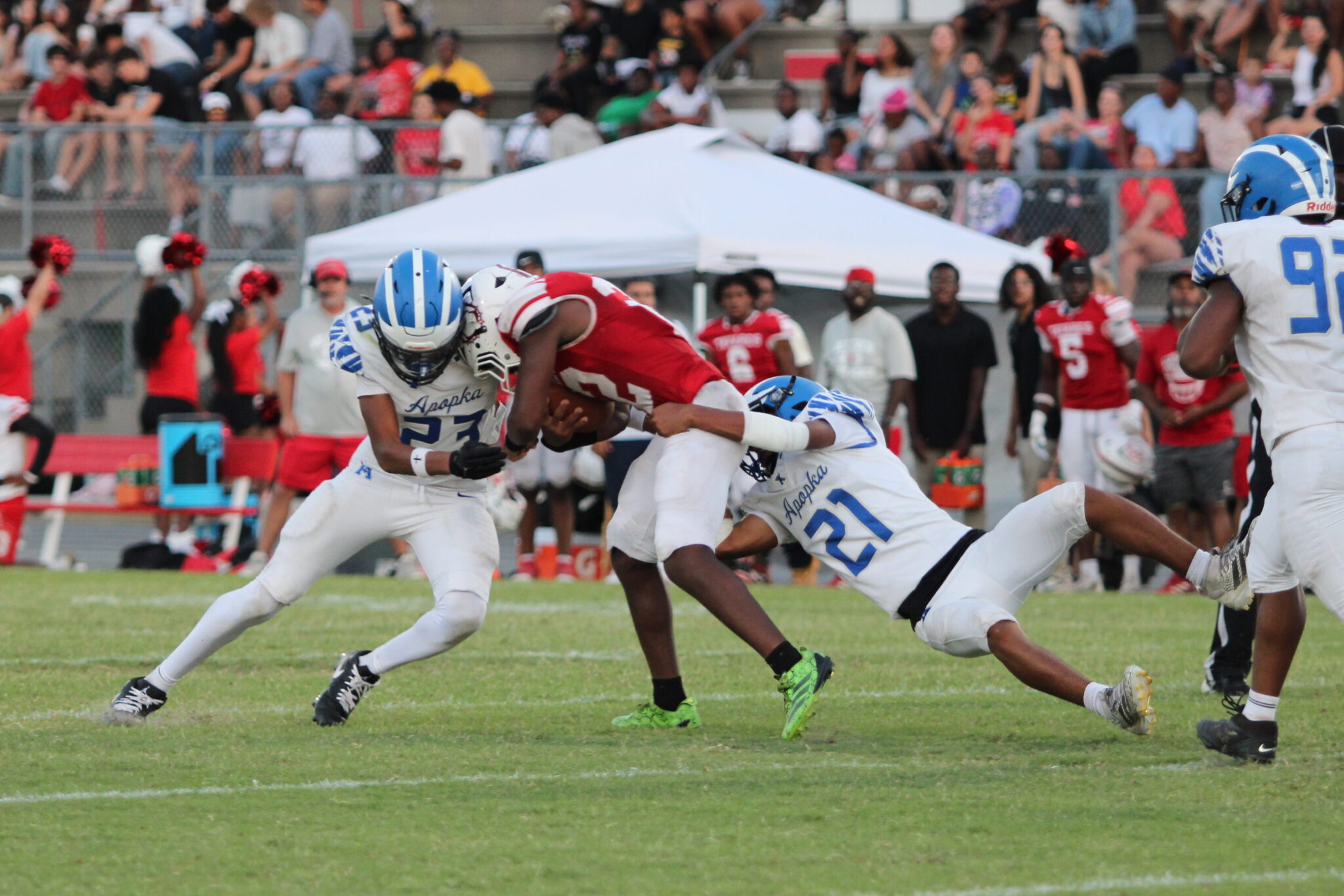 David Wimberly and Irish Ferrer sandwich the ballcarrier