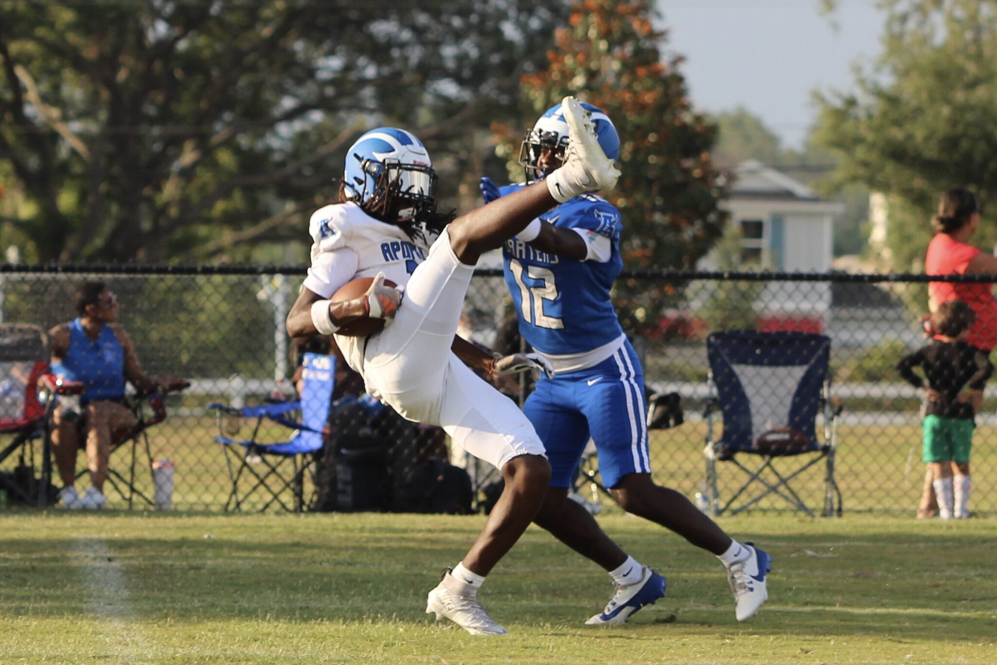 Nyzier Collington comes down with the spectacular catch near the goal line.