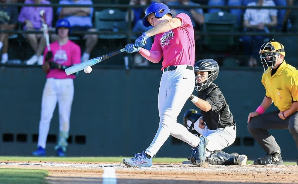 Jez Hamrick puts the bat on the ball in for team Orange County in the Cure All-Star game.