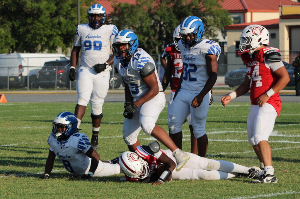 Kentral Baker gets pumped up after smashing the Tavares Quarterback into the dirt.