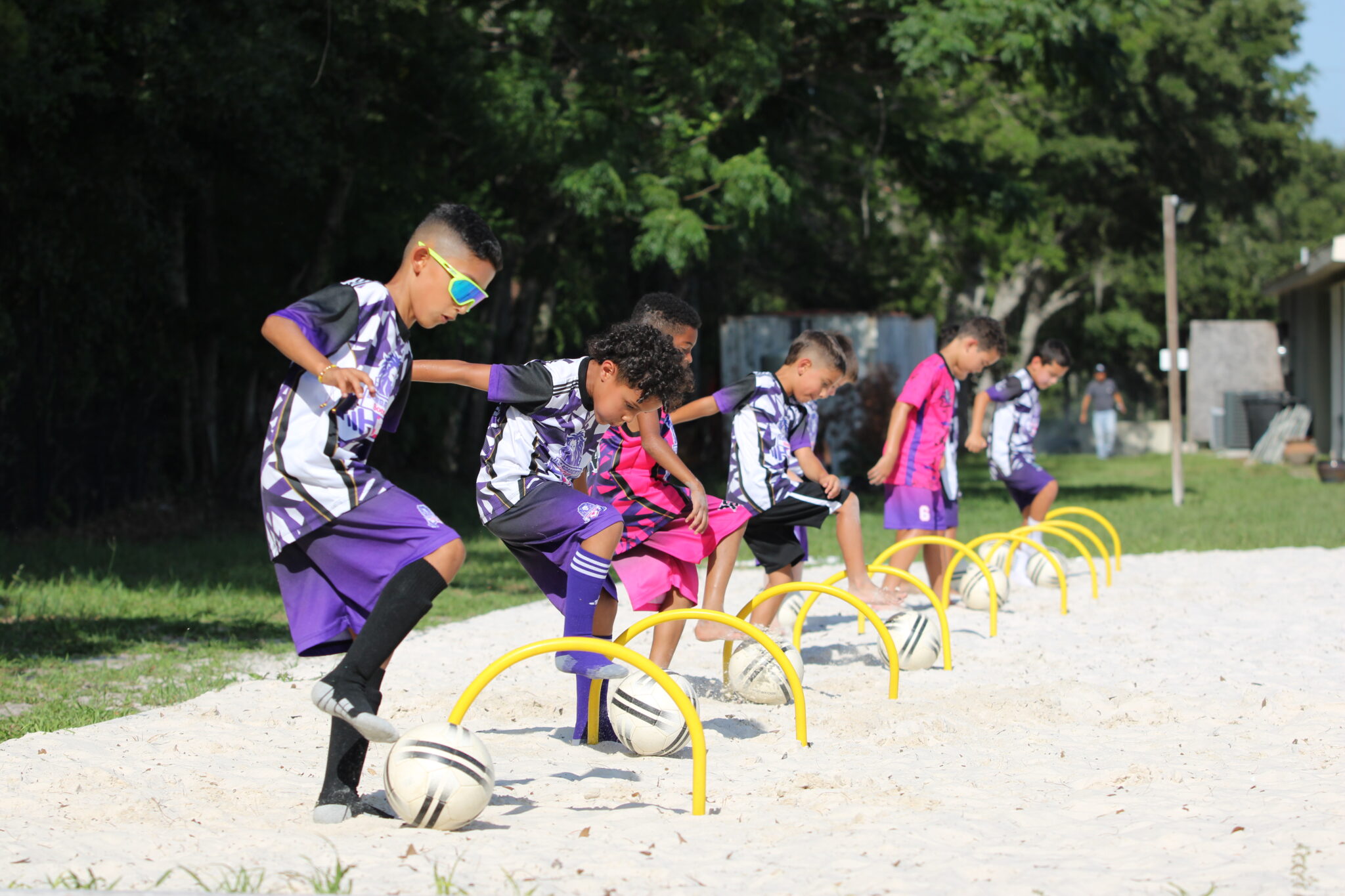 Longa Academy futures program works on their dribbling technique.