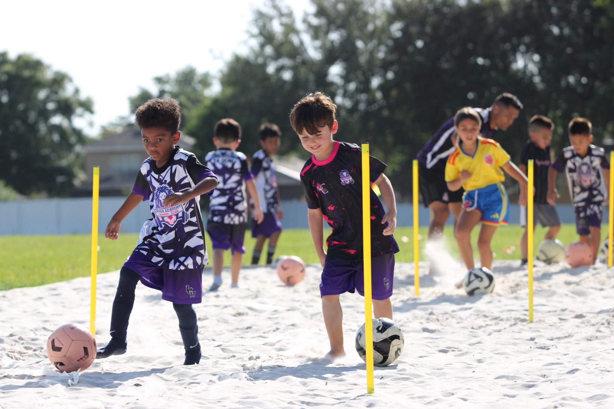 Longa Academy kids having fun in training.