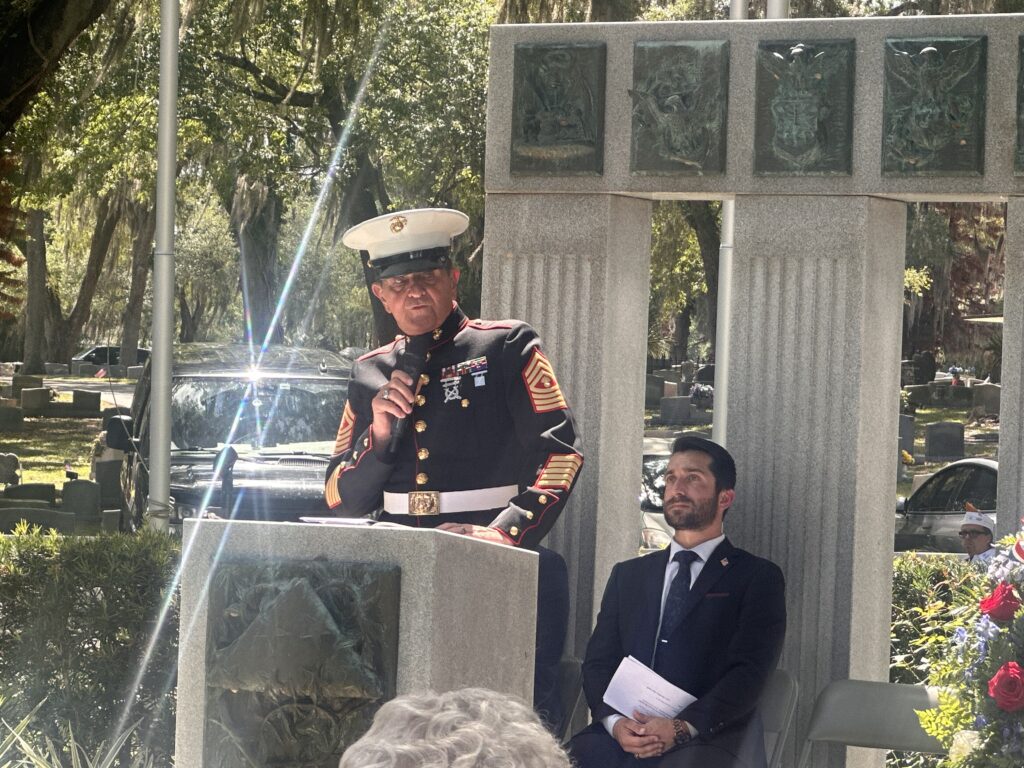 Pastor David Schorejs, senior pastor of First Baptist Church of Apopka and a U.S. Marine Corps veteran, delivers the keynote address during Apopka’s Memorial Day ceremony Monday as Mayor Nick Nesta listens nearby. 