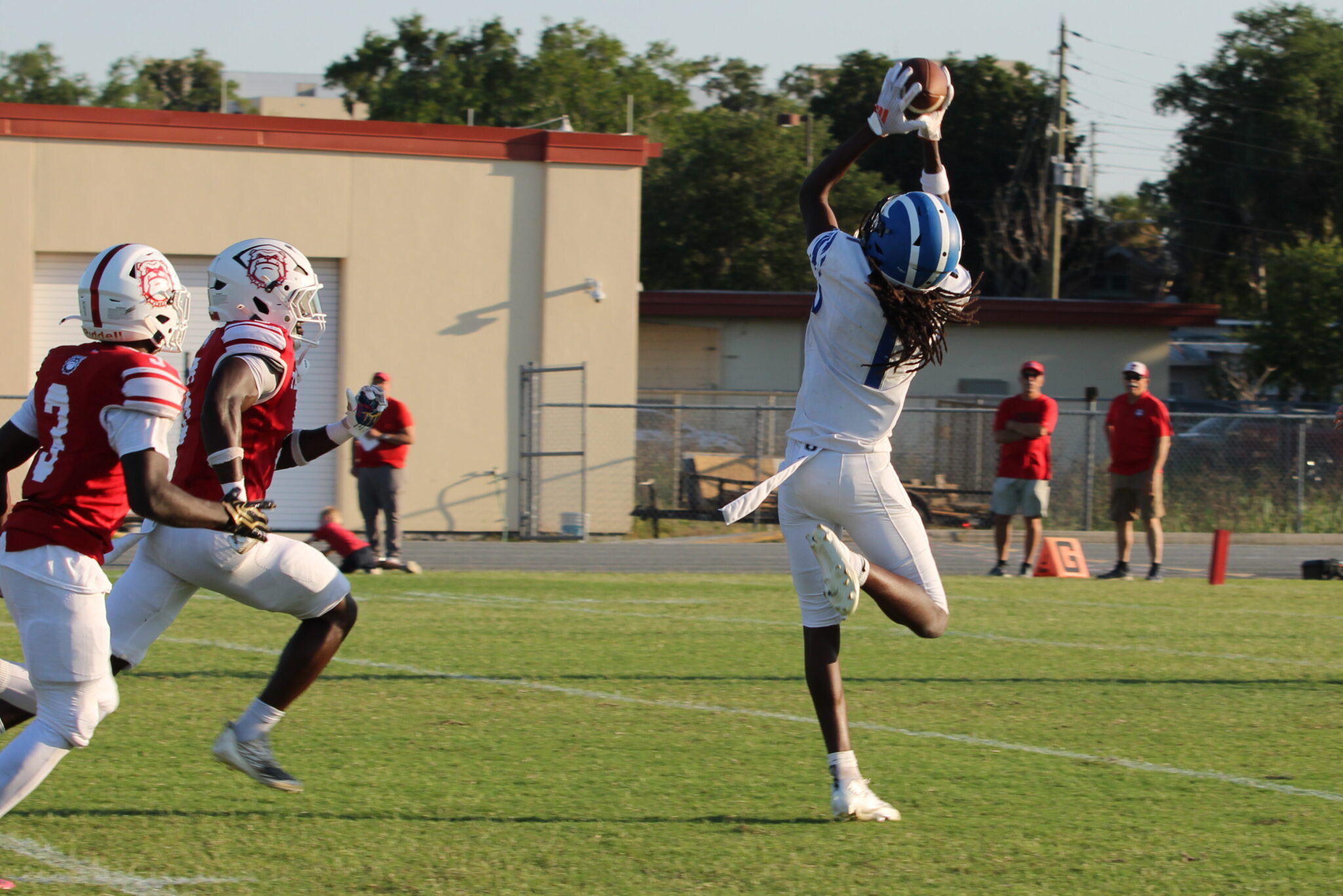 Nyzier Collington catches a deep ball from McNenney in stride at the 17 yard line.