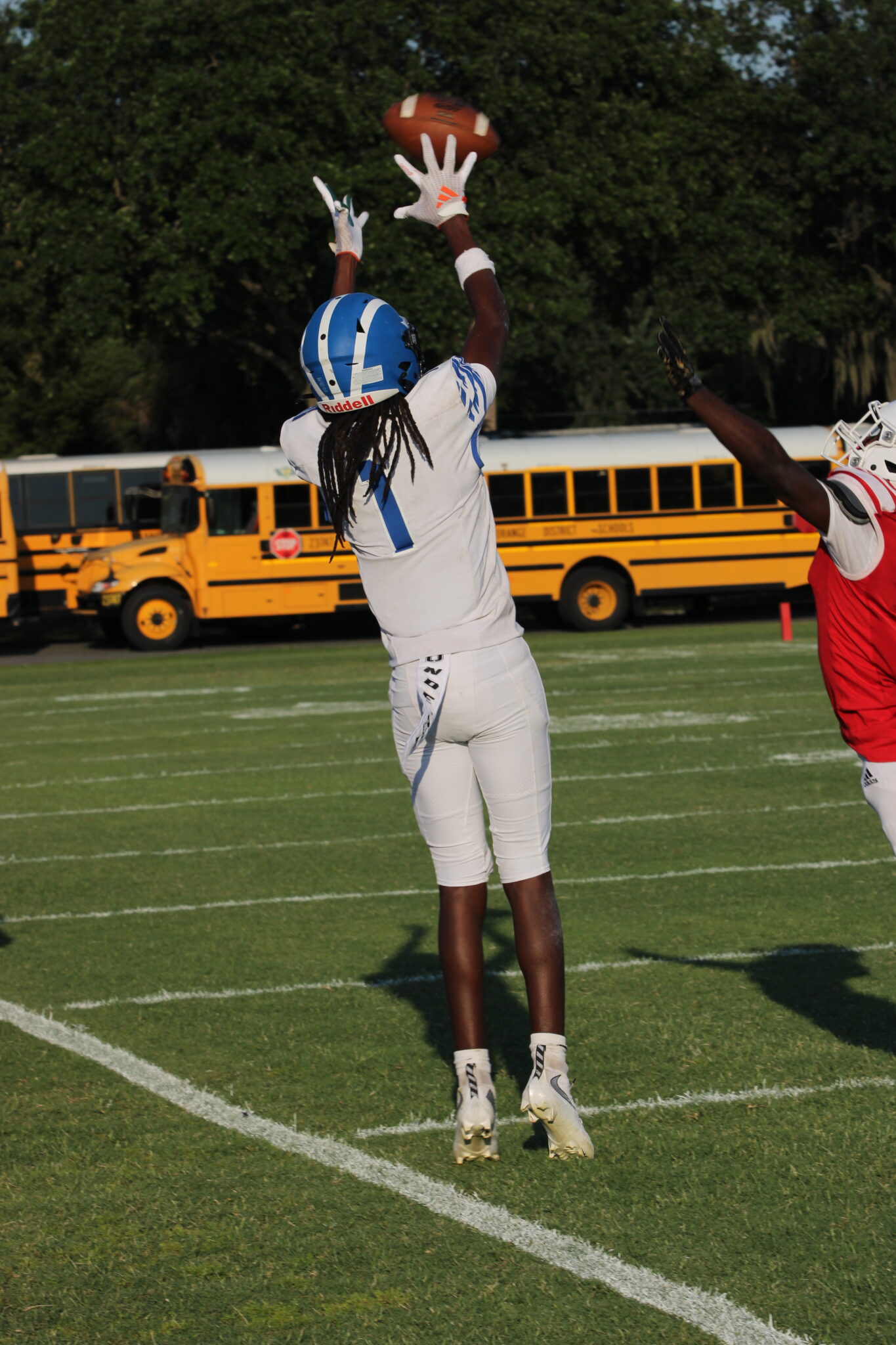 Nyzier Collington makes a toe tap catch on the Darter sideline against Tavares