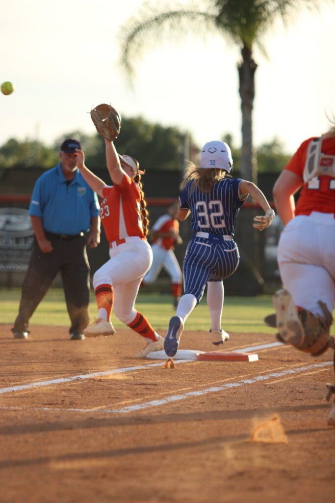Sydney Bartkin beats out a throw to first for one of their two hits in the game